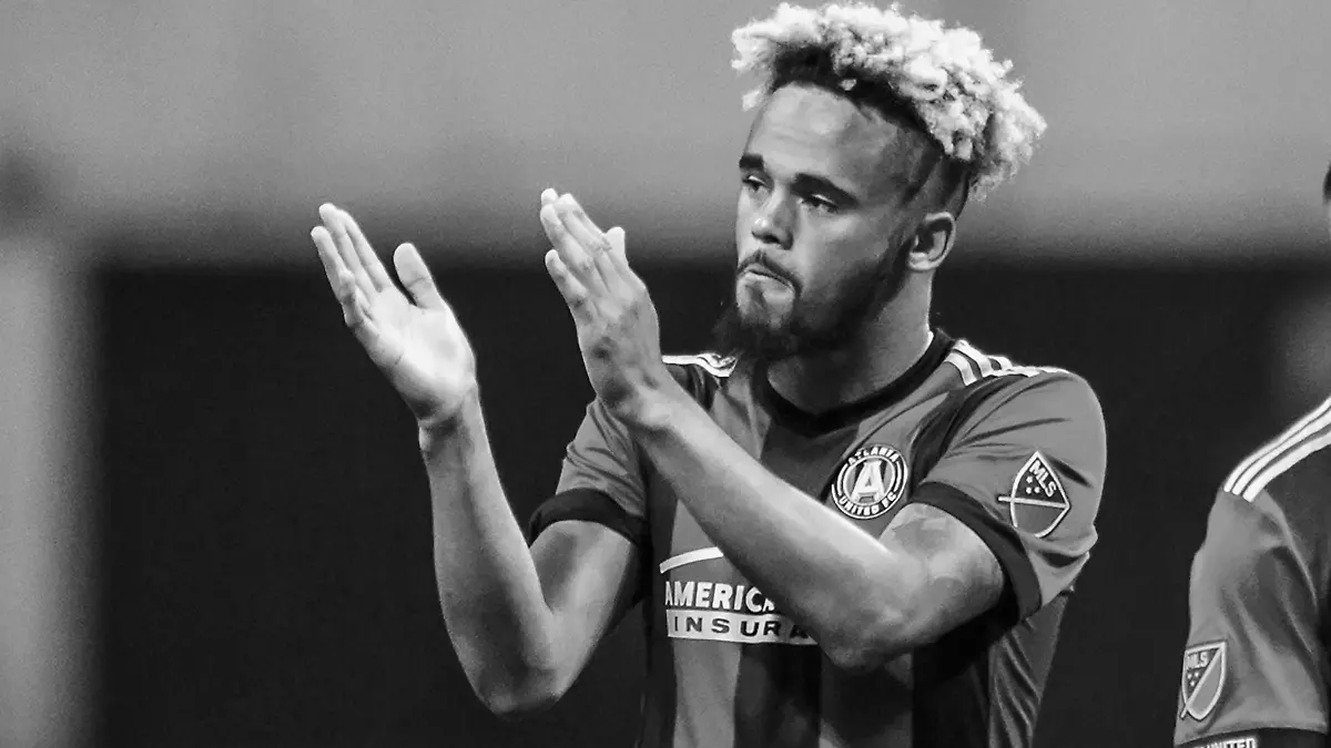 FILE - Atlanta United midfielder Anton Walkes (26) acknowledges the fans after an MLS playoff soccer game against Columbus Crew, in Atlanta, Thursday, Oct. 26, 2017. Soccer player Anton Walkes, who started his career at Tottenham, died Thursday, Jan. 19, 2023, after an accident in Florida, his MLS club Charlotte FC said. He was 25.(AP Photo/Danny Karnik, File)