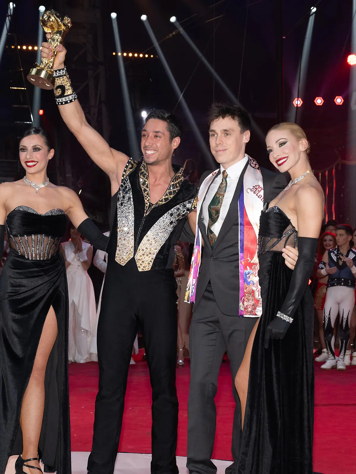 MONACO, MONACO - JANUARY 24: (NO TABLOIDS, NO VOICI, NO CLOSER) Louis Ducruet (2R) poses with the Clown D'Or winners René Cassely Junior with Merrylu Casselly and Quincy Azzario during the 45th International Circus Festival : Day Five on January 24, 2023 in Monaco, Monaco. (Photo by David Niviere/ SC Pool - Corbis/Corbis via Getty Images)