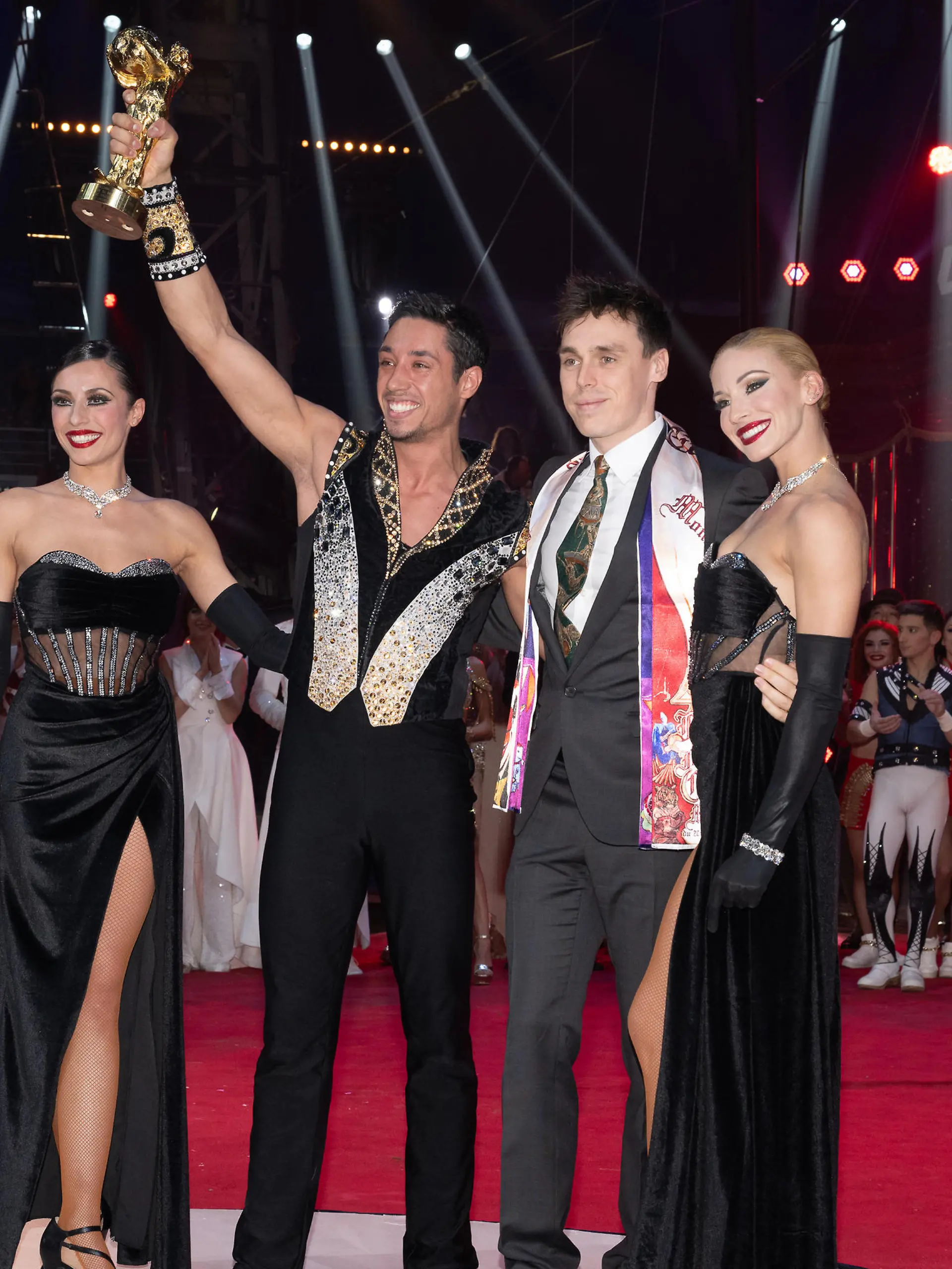 MONACO, MONACO - JANUARY 24: (NO TABLOIDS, NO VOICI, NO CLOSER) Louis Ducruet (2R) poses with the Clown D'Or winners René Cassely Junior with Merrylu Casselly and Quincy Azzario during the 45th International Circus Festival : Day Five on January 24, 2023 in Monaco, Monaco. (Photo by David Niviere/ SC Pool - Corbis/Corbis via Getty Images)