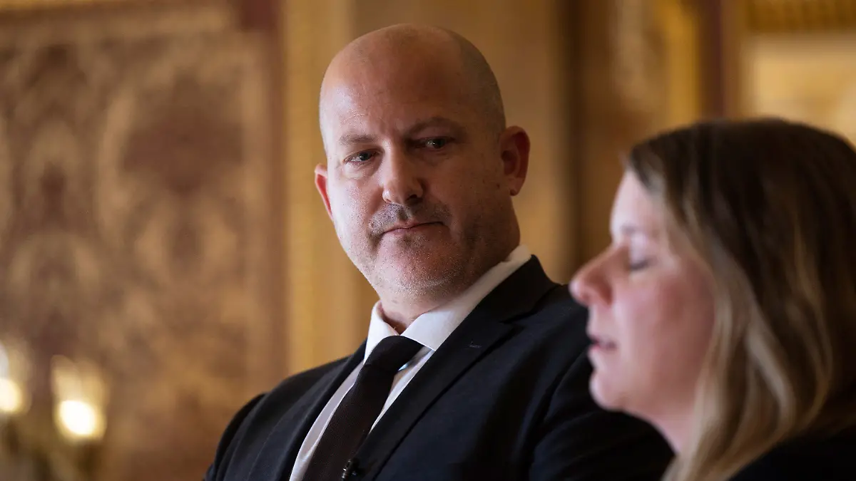 Joe Petito, father of Gabby Petito, looks at Nicole Schmidt during a press conference for SB117, a bill advocating for domestic violence protections, at the Capitol in Salt Lake City, on Monday, Jan. 30, 2023. (Ryan Sun/The Deseret News via AP)