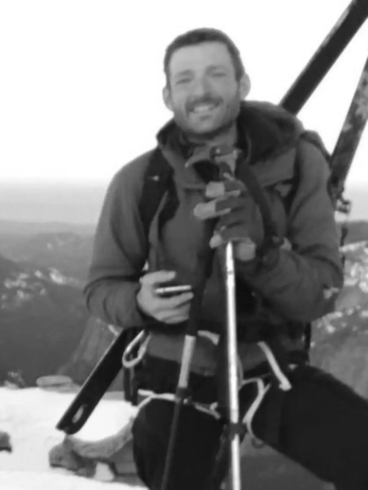 In this photo provided by Jason Torlano, he poses with his friend, Zach Milligan, right, on Half Dome in Yosemite National Park, Calif., on Sunday, Feb. 21, 2021. Two men climbed some 4,000 feet to the top of Yosemite's Half Dome in subfreezing temperatures and skied down the famously steep monolith to the valley floor. Torlano, 45, and Milligan, 40, completed the daring descent in five hours on Sunday by charging down Half Dome's arching back and using ropes to rappel down several sections of bare rock known as the "death slabs," the Fresno Bee reported on Thursday. (Jason Torlano via AP)