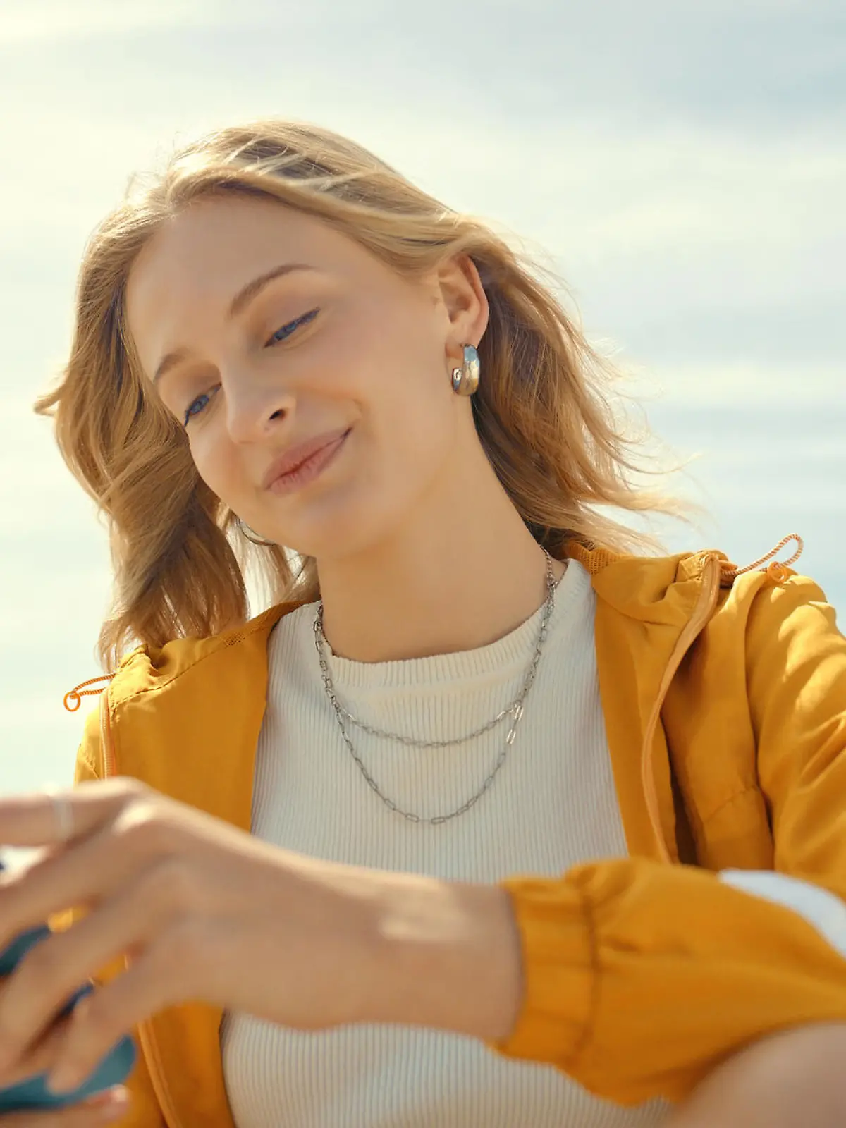 Phone, city and trendy woman on mobile app, chatting or texting for 5g networking, young fashion blog or social media. Streetwear student or gen z person on smartphone, cellphone and internet outdoor