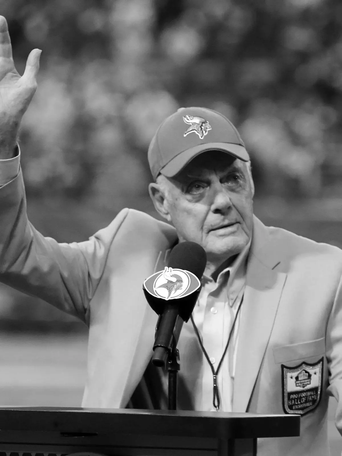 Former Minnesota Vikings Hall of Fame coach Bud Grant waves a final goodbye to the Metrodome during ceremonies following the Vikings NFL football against the Detroit Lions, Sunday, Dec. 29, 2013, in Minneapolis. Grant, the stoic and demanding Hall of Fame coach who took the Minnesota Vikings and their mighty Purple People Eaters defense to four Super Bowls in eight years and lost all of them, has died. He was 95. (AP Photo/Jim Mone, File