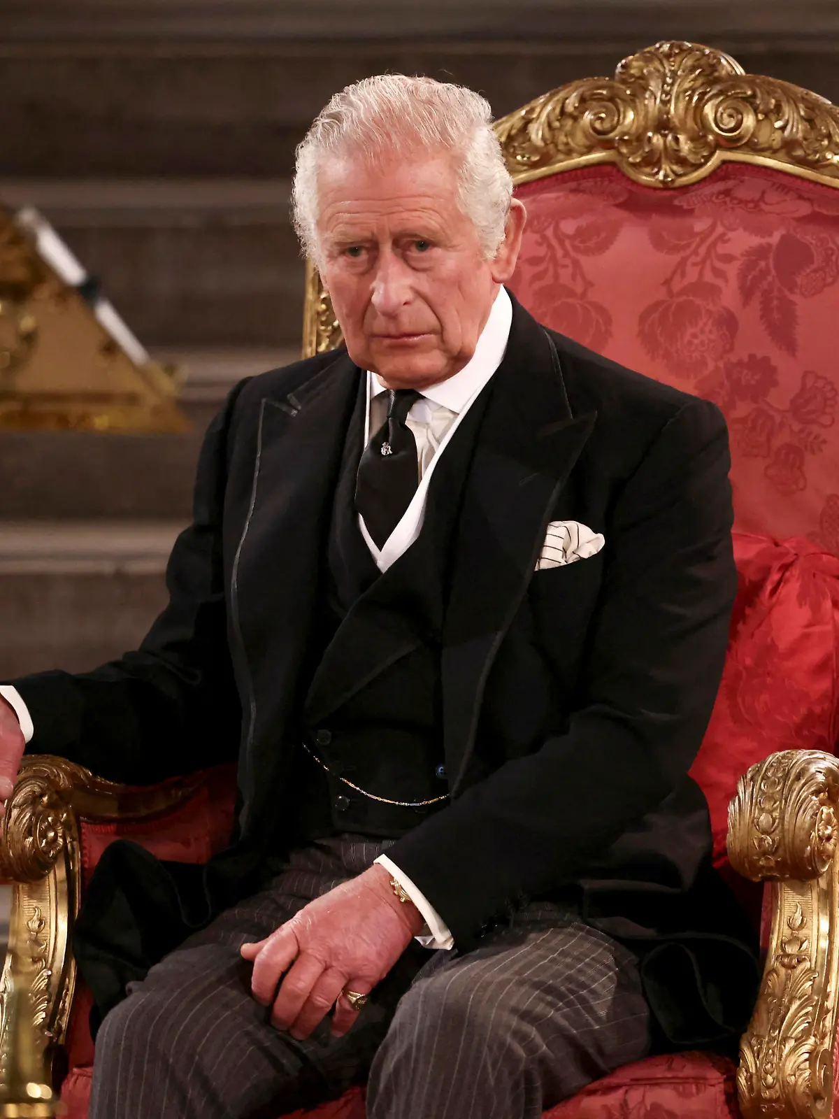 Britain's King Charles III sits at Westminster Hall, where both Houses of Parliament are meeting to express their condolences following the death of Queen Elizabeth II, at Westminster Hall, in London, Monday, Sept. 12, 2022. Queen Elizabeth II, Britain's longest-reigning monarch, died Thursday after 70 years on the throne. (Henry Nicholls/Pool Photo via AP)