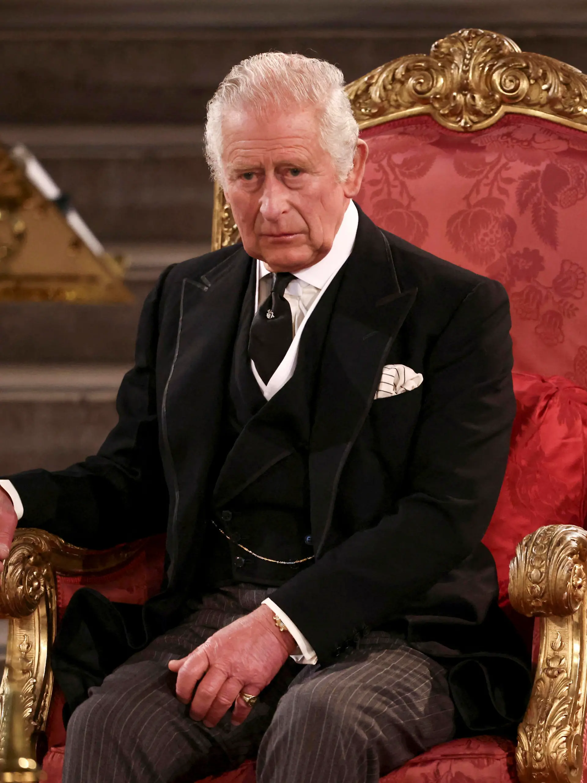 Britain's King Charles III sits at Westminster Hall, where both Houses of Parliament are meeting to express their condolences following the death of Queen Elizabeth II, at Westminster Hall, in London, Monday, Sept. 12, 2022. Queen Elizabeth II, Britain's longest-reigning monarch, died Thursday after 70 years on the throne. (Henry Nicholls/Pool Photo via AP)