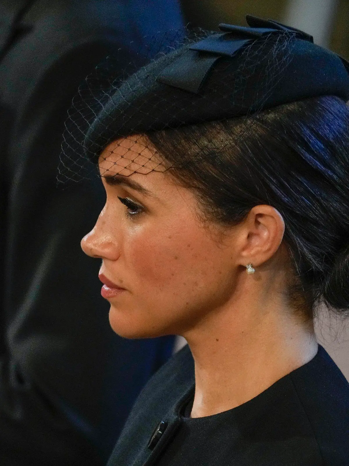 14.09.2022, Großbritannien, London: Meghan, Herzogin von Sussex, steht in der Westminster Hall, nachdem sie an der Prozession des Sarges von Königin Elizabeth teilgenommen hat. Die Königin wird vier Tage lang in der Westminster Hall aufgebahrt, bevor sie am Montag, dem 19. September, beigesetzt wird. Die britische Königin Elizabeth II. ist am 08.09.2022 im Alter von 96 Jahren gestorben. Foto: Gregorio Borgia/AP Pool/dpa +++ dpa-Bildfunk +++