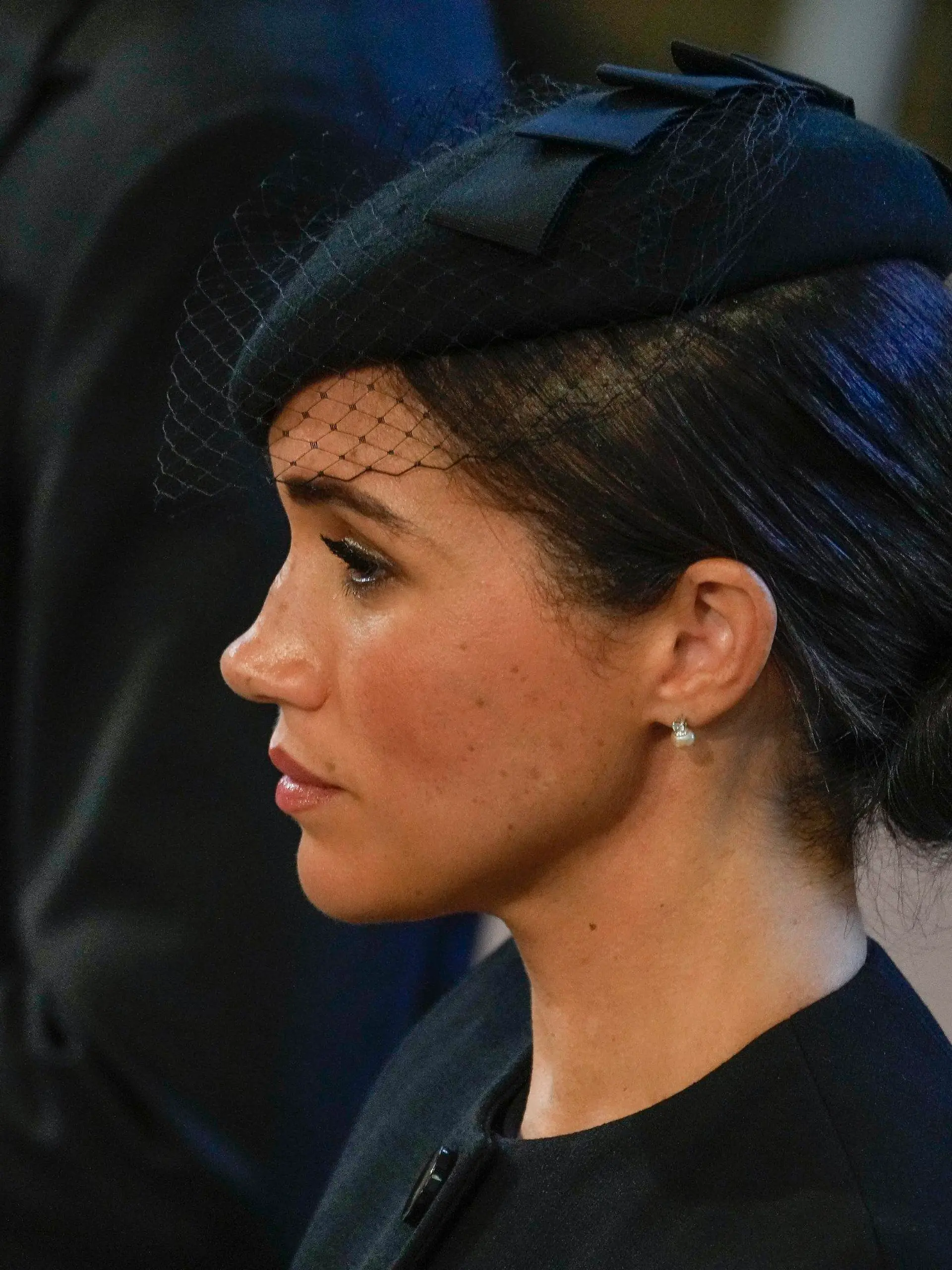 14.09.2022, Großbritannien, London: Meghan, Herzogin von Sussex, steht in der Westminster Hall, nachdem sie an der Prozession des Sarges von Königin Elizabeth teilgenommen hat. Die Königin wird vier Tage lang in der Westminster Hall aufgebahrt, bevor sie am Montag, dem 19. September, beigesetzt wird. Die britische Königin Elizabeth II. ist am 08.09.2022 im Alter von 96 Jahren gestorben. Foto: Gregorio Borgia/AP Pool/dpa +++ dpa-Bildfunk +++