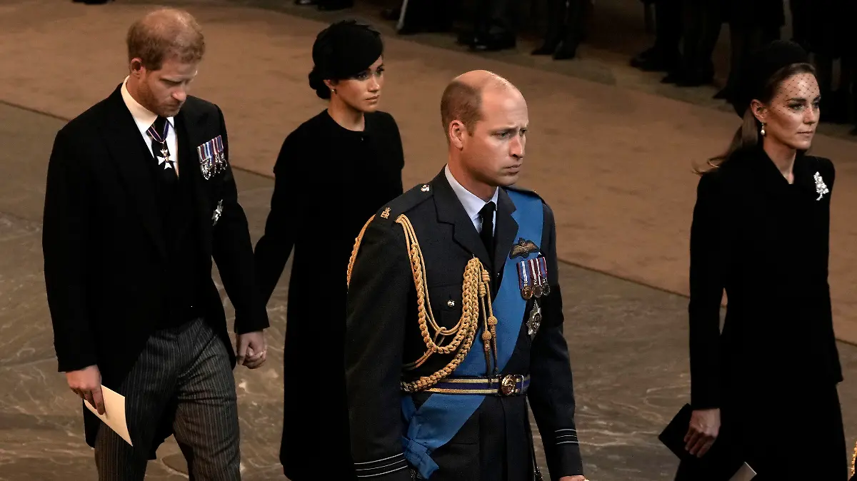 Prince Harry, left, and Meghan, second left, Duchess of Sussex, Prince William, second right, and Kate, Princess of Wales leave Westminster Hall in London, Wednesday, Sept. 14, 2022. The Queen Elizabeth II will lie in state in Westminster Hall for four full days before her funeral on Monday Sept. 19. (AP Photo/Nariman El-Mofty, Pool)