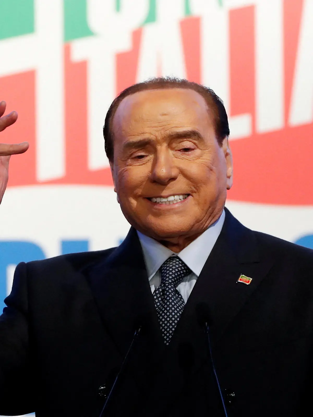 FILE PHOTO: Former Italian Prime Minister and leader of the Forza Italia (Go Italy!) party Silvio Berlusconi attends a rally in Rome, Italy, April 9, 2022. REUTERS/Remo Casilli/File Photo