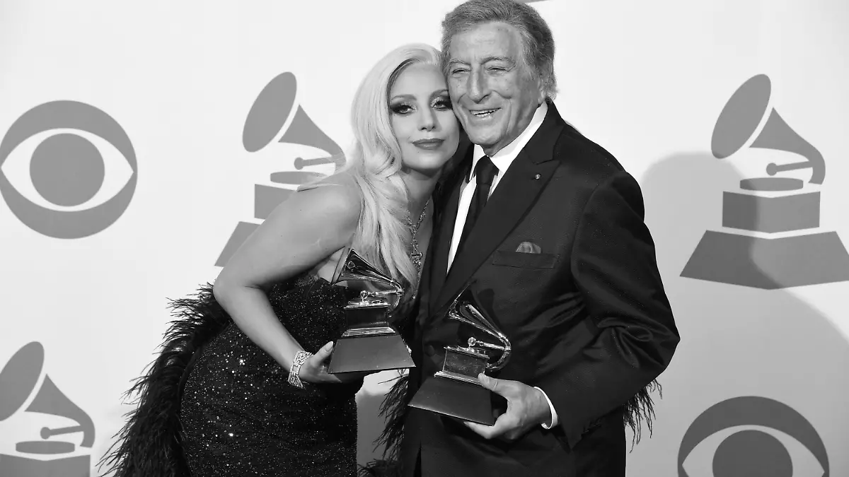 FILE - Lady Gaga, left, and Tony Bennett pose in the press room with the award for best traditional pop vocal album for "Cheek to Cheek" at the 57th annual Grammy Awards at the Staples Center on Sunday, Feb. 8, 2015, in Los Angeles. Bennett, the eminent and timeless stylist whose devotion to classic American songs and knack for creating new standards such as "I Left My Heart In San Francisco" graced a decadeslong career that brought him admirers from Frank Sinatra to Lady Gaga, died Friday, July 21, 2023. He was 96. (Photo by Chris Pizzello/Invision/AP, File)