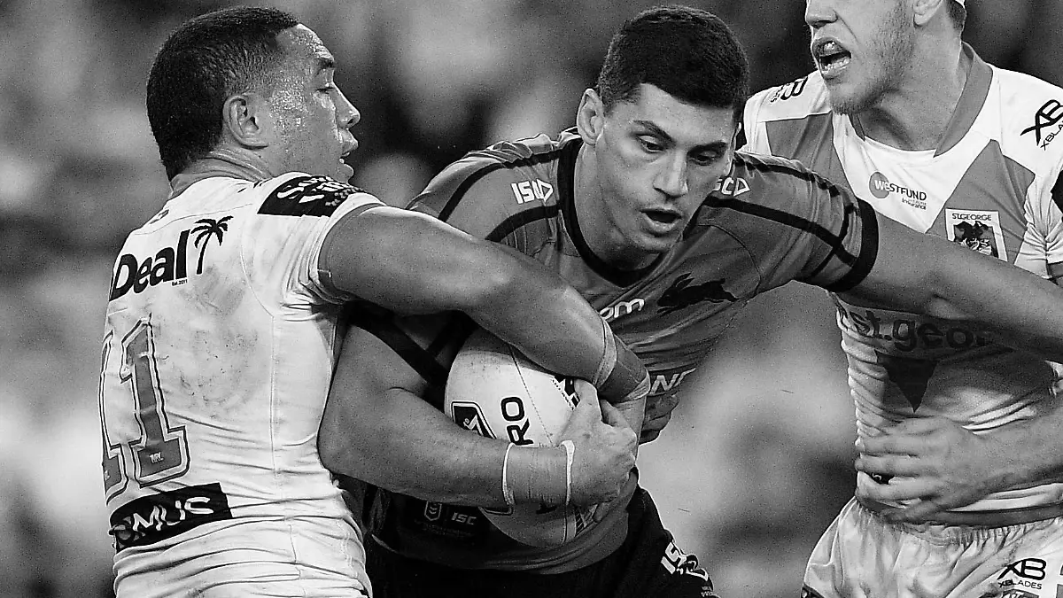 NRL RABBITOHS DRAGONS, Kyle Turner of the Rabbitohs is tackled by Tyson Frizell (left) and Cameron McInnes of the Dragons during the Round 19 NRL match between the South Sydney Rabbitohs and the St George Illawarra Dragons at ANZ Stadium in Sydney, Friday, July 26, 2019. ( !ACHTUNG: NUR REDAKTIONELLE NUTZUNG, KEINE ARCHIVIERUNG UND KEINE BUCHNUTZUNG! SYDNEY NSW AUSTRALIA PUBLICATIONxINxGERxSUIxAUTxONLY Copyright: xDANxHIMBRECHTSx 20190726001410657307