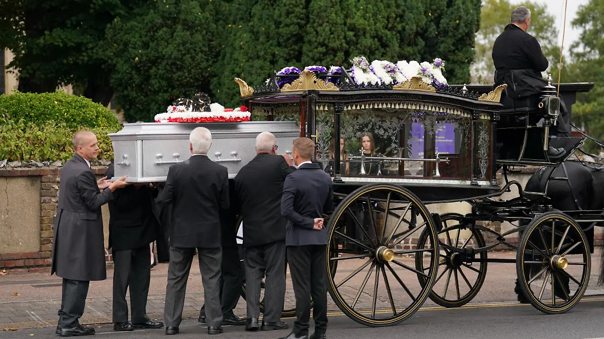 The coffin of 12-year-old Archie Battersbee is taken from St Mary's Church, Prittlewell, Southend-on-Sea, Essex after his funeral. The young boy, who was at the centre of a life-support treatment fight during the summer, died on August 6. Picture date: Tuesday September 13, 2022.