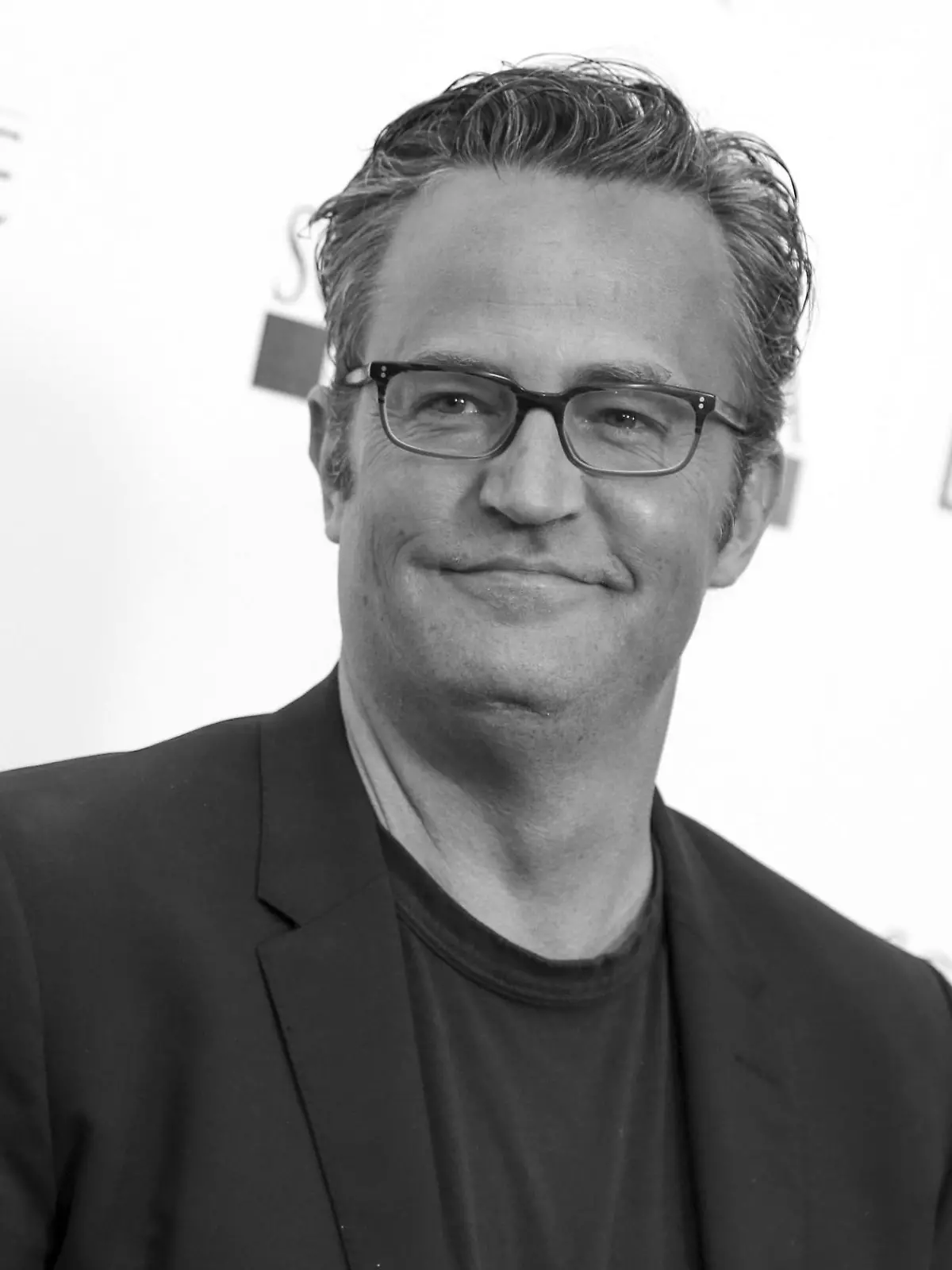 FILE - Matthew Perry arrives at the premiere of "Ride" at The Arclight Hollywood Theater in Los Angeles. Perry, who starred as Chandler Bing in the hit series "Friends," has died. He was 54. The Emmy-nominated actor was found dead of an apparent drowning at his Los Angeles home on Saturday, according to the Los Angeles Times and celebrity website TMZ, which was the first to report the news. Both outlets cited unnamed sources confirming Perry's death. His publicists and other representatives did not immediately return messages seeking comment. (Photo by Rich Fury/Invision/AP, File)