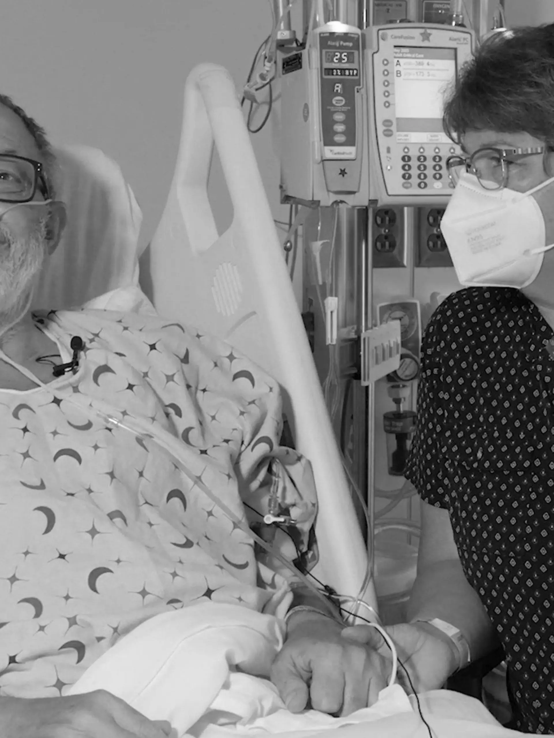 FILE - In this photo provided by the University of Maryland School of Medicine, Lawrence Faucette sits with wife, Ann, in the school's hospital in Baltimore, Md., in September 2023, before receiving a pig heart transplant. Lawrence Faucette, the second person to receive a transplanted heart from a pig has died, nearly six weeks after the highly experimental surgery, his doctors announced Tuesday, Oct. 31, 2023. (Mark Teske/University of Maryland School of Medicine via AP, File)