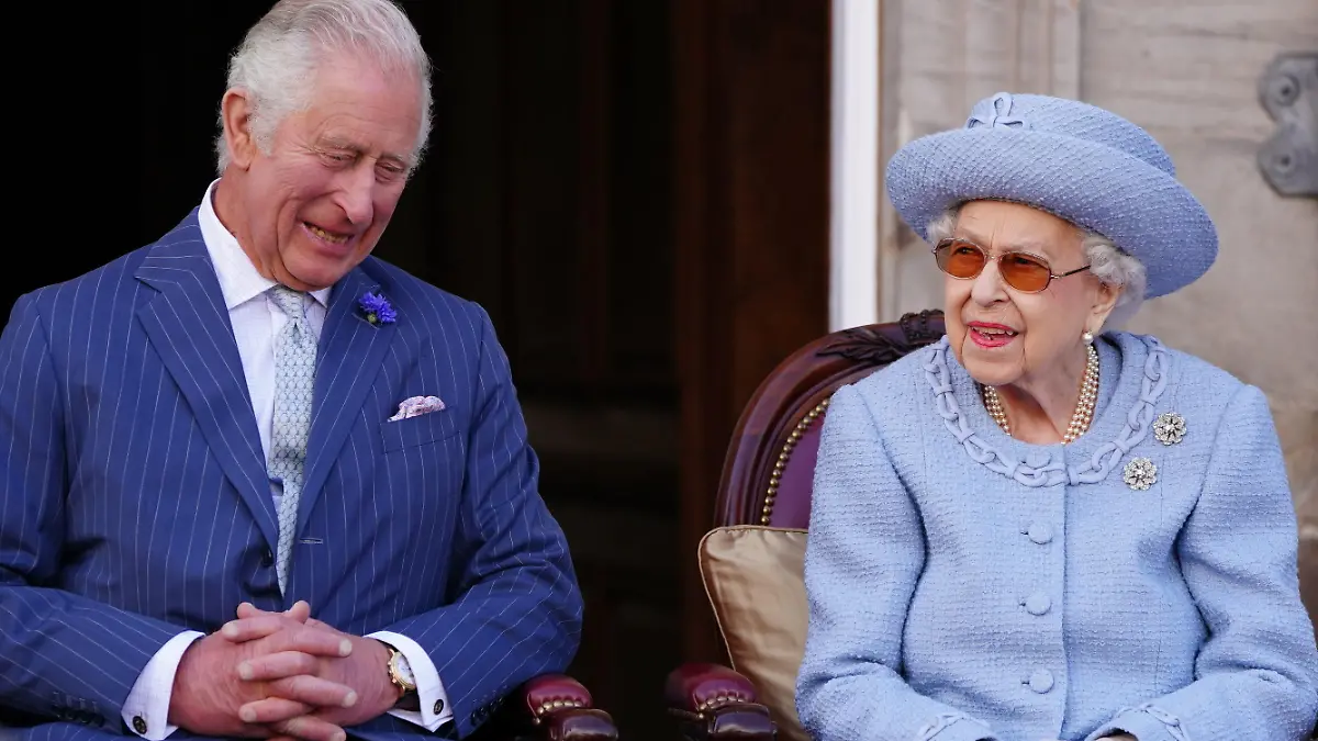 The Prince of Wales, known as the Duke of Rothesay when in Scotland and Queen Elizabeth II attending the Queen's Body Guard for Scotland (also known as the Royal Company of Archers) Reddendo Parade in the gardens of the Palace of Holyroodhouse, Edinburgh. Picture date: Thursday June 30, 2022., Credit:Avalon.red / Avalon