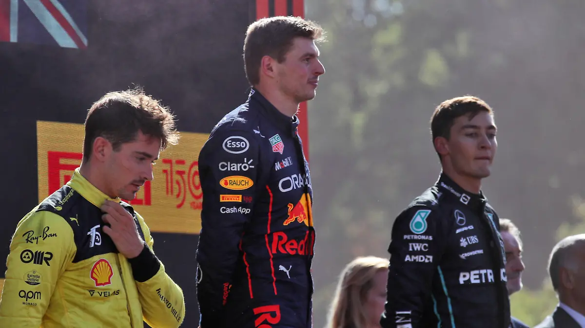 Italian Grand Prix - Race - Monza. The podium (L to R): Charles Leclerc (MON) Ferrari, second; Max Verstappen (NLD) Red Bull Racing, race winner; George Russell (GBR) Mercedes AMG F1, third. Italian Grand Prix, Sunday 11th September 2022. Monza Italy. URN:68765207