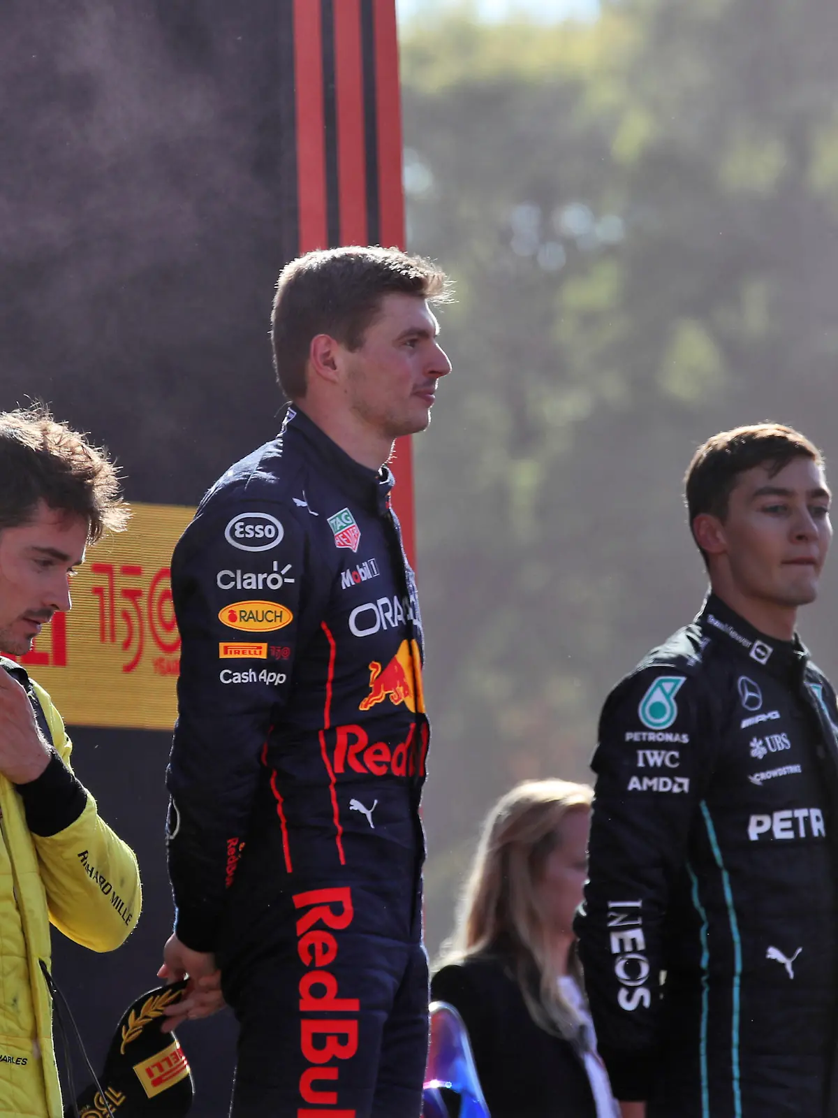 Italian Grand Prix - Race - Monza. The podium (L to R): Charles Leclerc (MON) Ferrari, second; Max Verstappen (NLD) Red Bull Racing, race winner; George Russell (GBR) Mercedes AMG F1, third. Italian Grand Prix, Sunday 11th September 2022. Monza Italy. URN:68765207