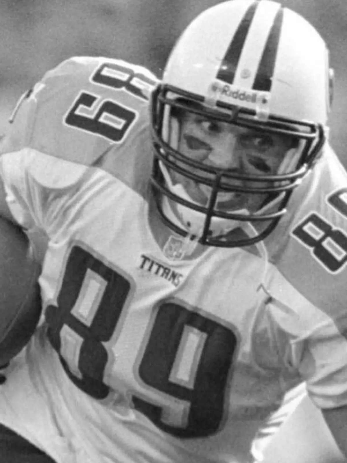 FILE - Tennessee Titans tight end Frank Wycheck runs with the ball during a football game against the Baltimore Ravens, Dec. 5, 1999, in Baltimore. The three-time Pro Bowler Wycheck, who threw the lateral that started the “Music City Miracle” launching the Tennessee Titans' run to the franchise's lone Super Bowl appearance, has died at age 52. Wycheck died at his Chattanooga, Tenn., home after an apparent fall where he hit his head Saturday morning, Dec. 9, 2023, according to a statement from his family released through the Legacy consulting firm. (AP Photo/Roberto Borea, File)