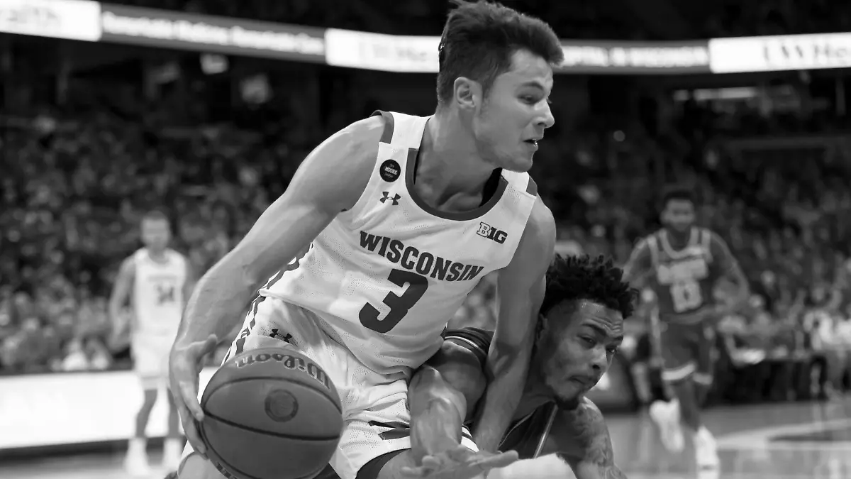 November 13, 2019: Wisconsin Badgers guard Walt McGrory (3) chases down a loose ball and is fouled in the process by a McNeese State player during the NCAA, College League, USA Basketball game between the McNeese State Cowboys and the Wisconsin Badgers at the Kohl Center in Madison, WI. /CSM NCAA Basketball 2019: McNeese State vs Wisconsin NOV 13 - ZUMAc04_ 20191113_zaf_c04_004 Copyright: xJohnxFisherx