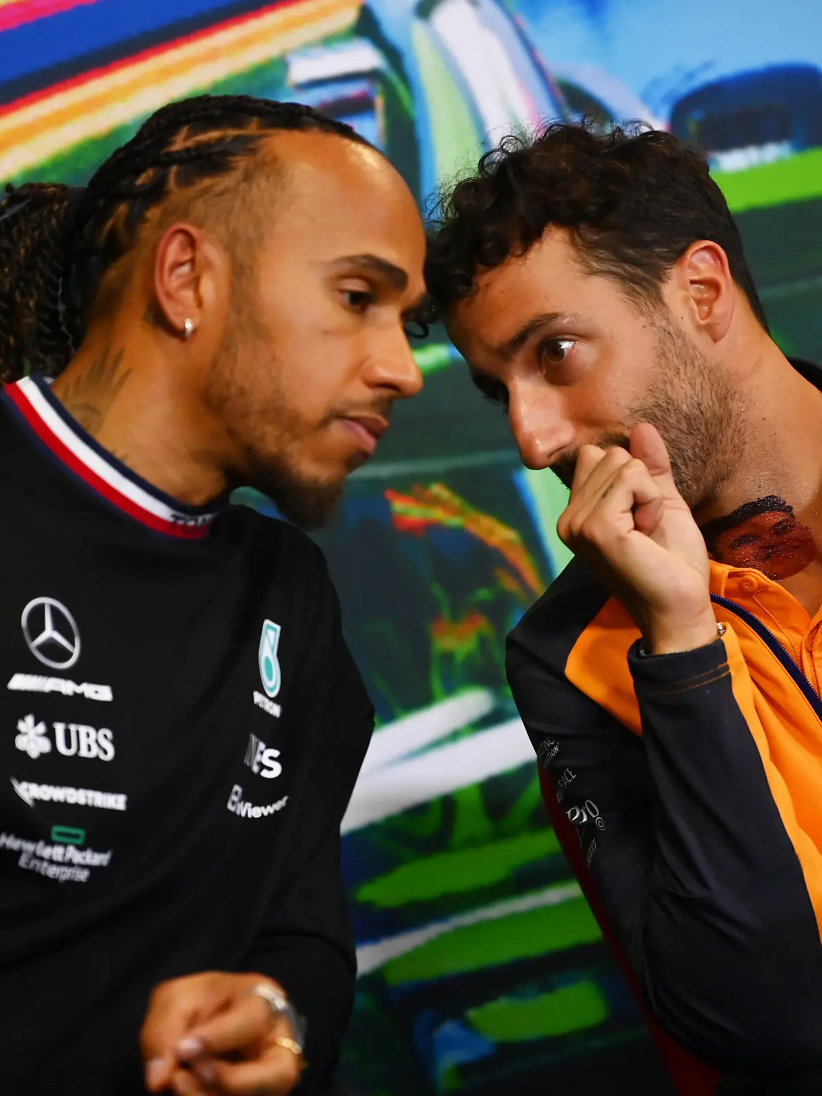 MONZA, ITALY - SEPTEMBER 08: Lewis Hamilton of Great Britain and Mercedes and Daniel Ricciardo of Australia and McLaren attend the drivers press conference  during previews ahead of the F1 Grand Prix of Italy at Autodromo Nazionale Monza on September 08, 2022 in Monza, Italy. (Photo by Dan Mullan/Getty Images)
