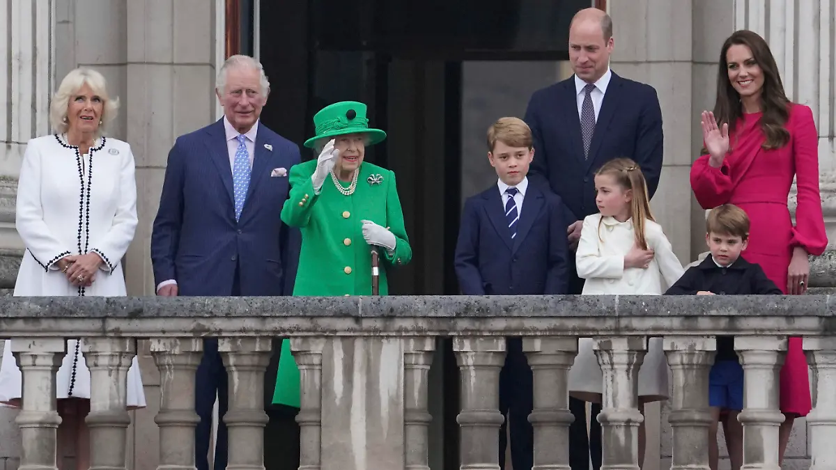 FILE From left, Camilla Duchess of Cornwall, Prince Charles, Queen Elizabeth II, Prince George, Prince William, Princess Charlotte, Prince Louis, and Kate, Duchess of Cambridge appear on the balcony of Buckingham Palace during the Platinum Jubilee Pageant outside Buckingham Palace in London, Sunday June 5, 2022. The death of Queen Elizabeth II means the younger generation of Britain’s royal family must step up their responsibilities significantly. (Jonathan Brady/Pool Photo via AP, File)