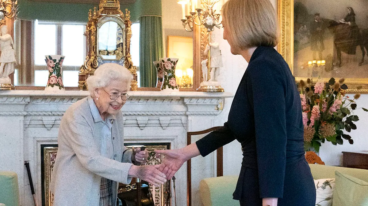 FILE - Britain's Queen Elizabeth II, left, welcomes Liz Truss during an audience at Balmoral, Scotland, where she invited the newly elected leader of the Conservative party to become Prime Minister and form a new government, Tuesday, Sept. 6, 2022. Queen Elizabeth II, Britain's longest-reigning monarch and a rock of stability across much of a turbulent century, died Thursday after 70 years on the throne. She was 96. (Jane Barlow/Pool Photo via AP, File)