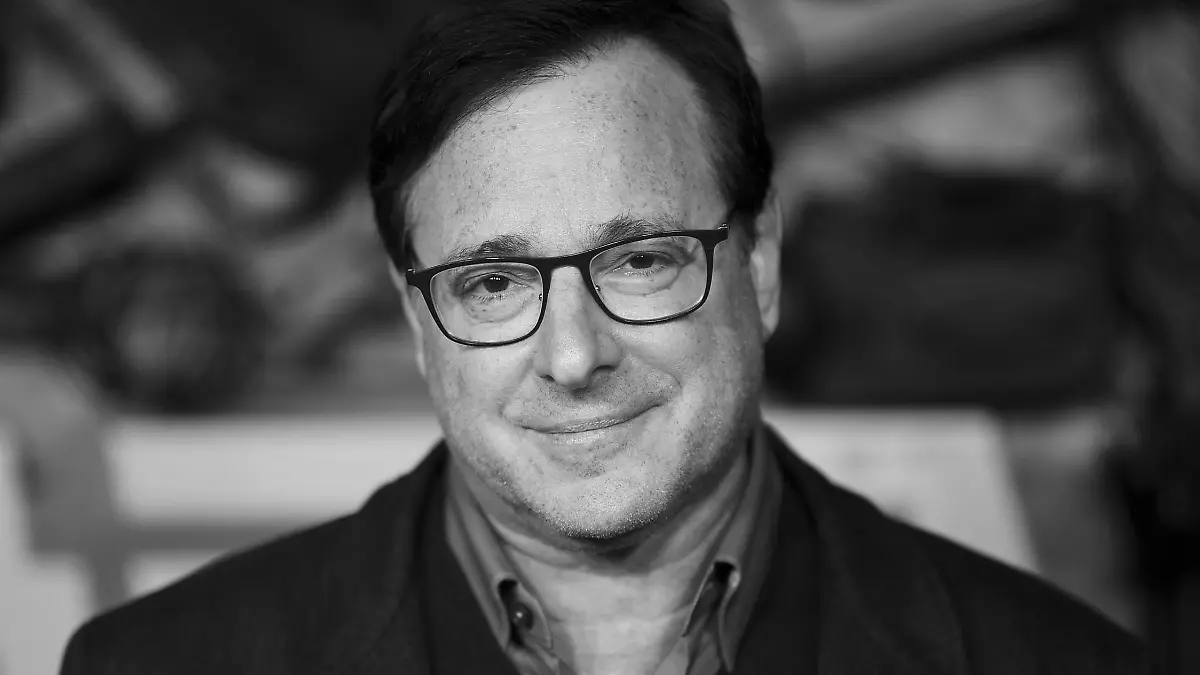 FILE - Bob Saget arrives at a screening of "MacGruber" on Dec. 8, 2021, in Los Angeles. Saget's family has released a statement on the cause of his death last month in Florida, citing authorities saying the actor-comedian died from an accidental blow to the head. (Photo by Richard Shotwell/Invision/AP, File)