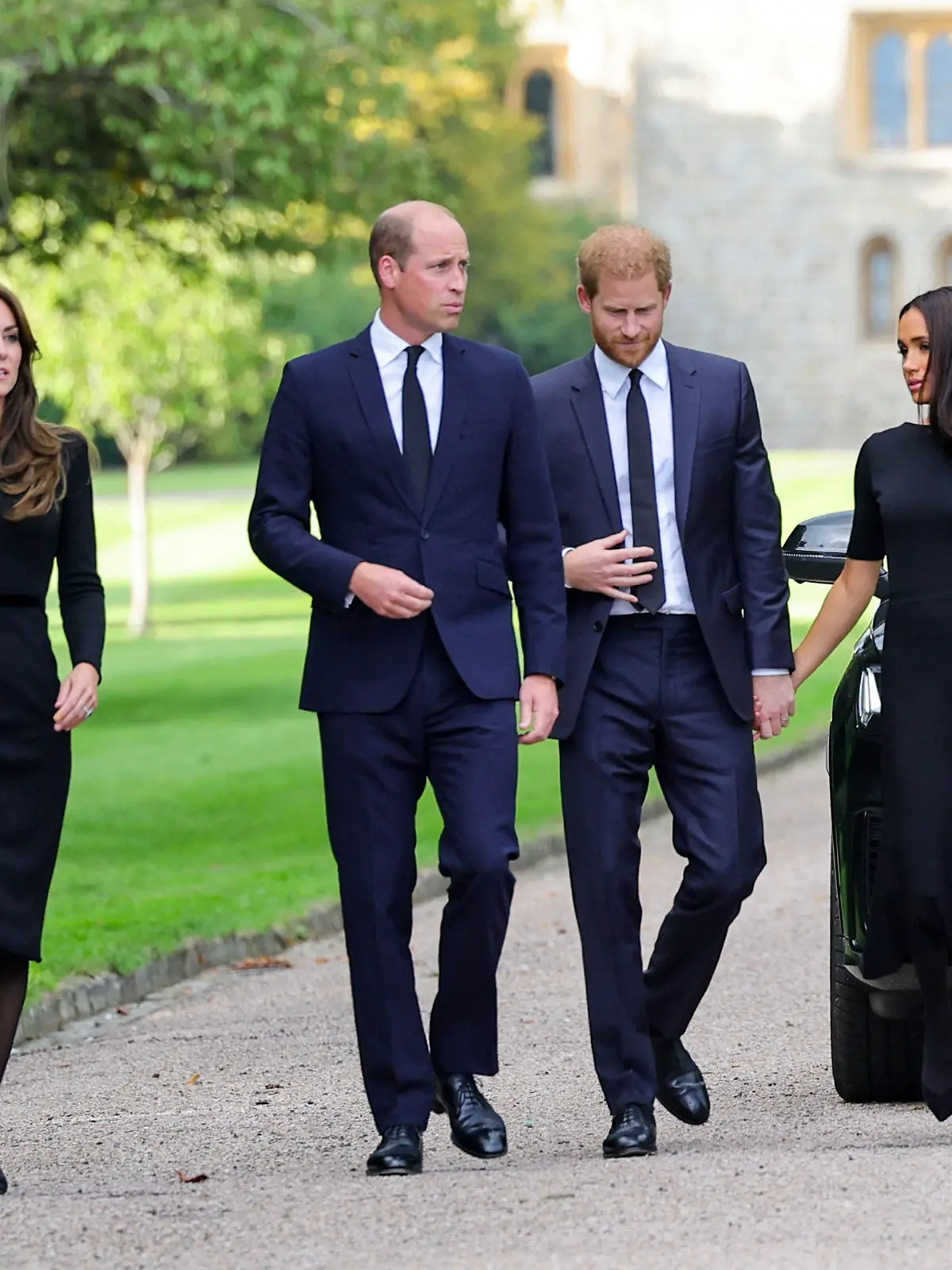 Britain's William, Prince of Wales, Catherine, Princess of Wales, Britain's Prince Harry and Meghan, the Duchess of Sussex on the long walk at Windsor Castle, following the passing of Britain's Queen Elizabeth, in Windsor, Britain, September 10, 2022. Chris Jackson/Pool via REUTERS