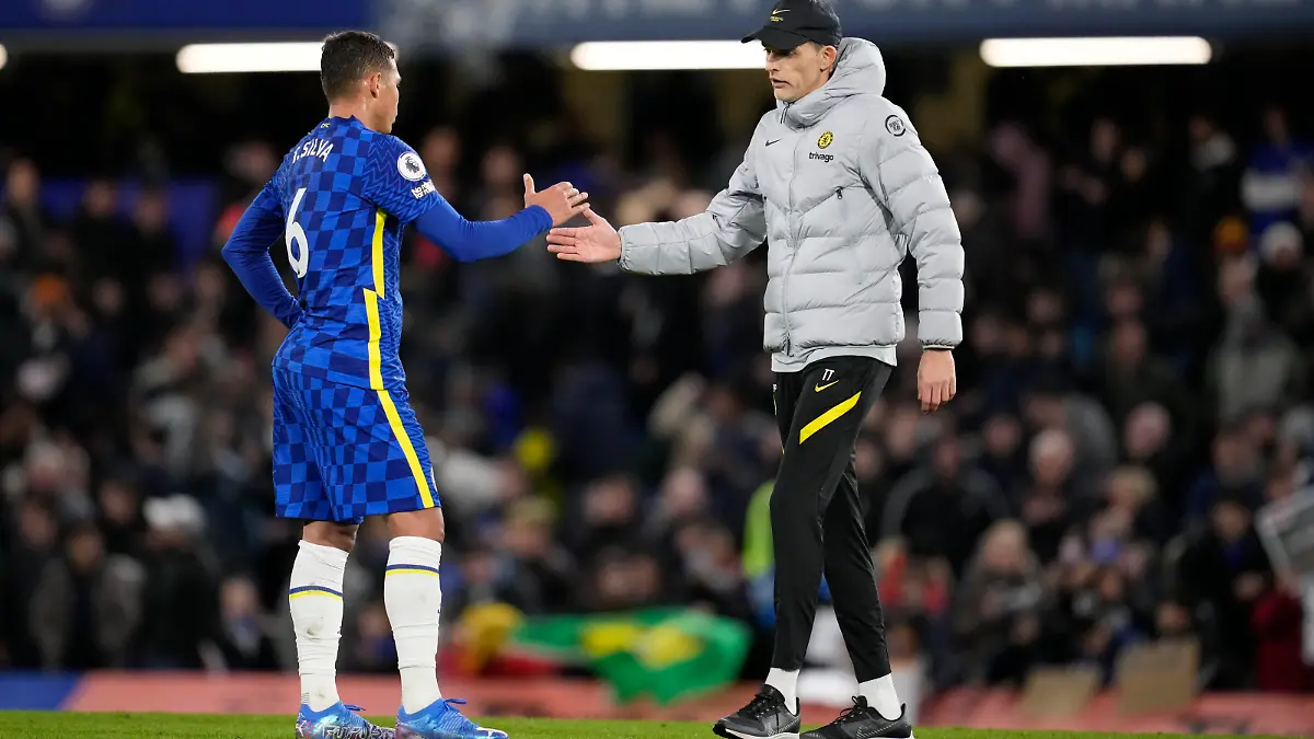 Chelsea's head coach Thomas Tuchel greets Chelsea's Thiago Silva after the English Premier League soccer match between Chelsea and Liverpool at Stamford Bridge in London, Sunday, Jan. 2, 2022. The match ended in a 2-2 draw. (AP Photo/Matt Dunham)