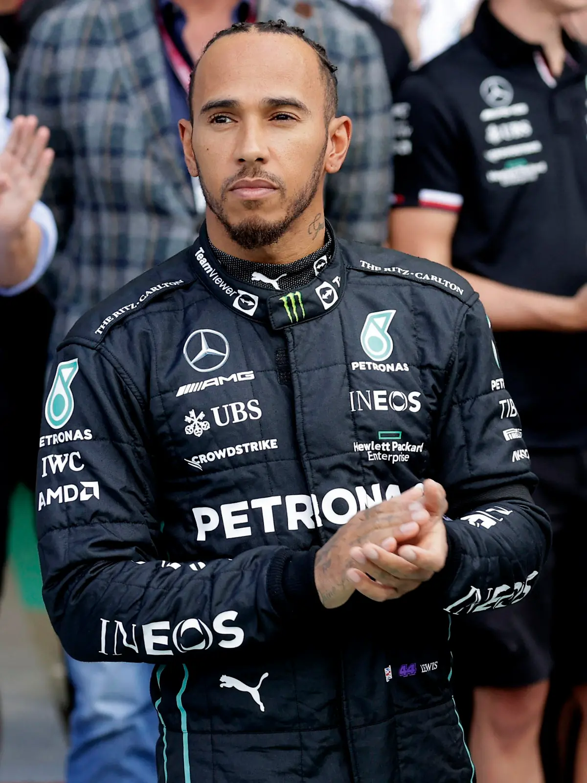 Formula One F1 - Italian Grand Prix - Autodromo Nazionale Monza, Monza, Italy - September 9, 2022 Mercedes' Lewis Hamilton during a moments applause after the passing of Britain's Queen Elizabeth before practice REUTERS/Ciro De Luca