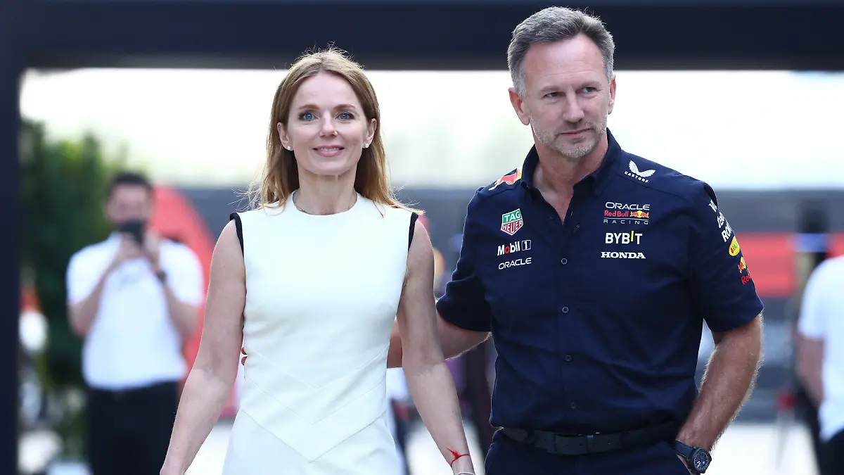 BAHRAIN, BAHRAIN - MARCH 02: Oracle Red Bull Racing Team Principal Christian Horner and Geri Horner walk in the Paddock holding hands prior to the F1 Grand Prix of Bahrain at Bahrain International Circuit on March 02, 2024 in Bahrain, Bahrain. (Photo by Clive Rose/Getty Images)