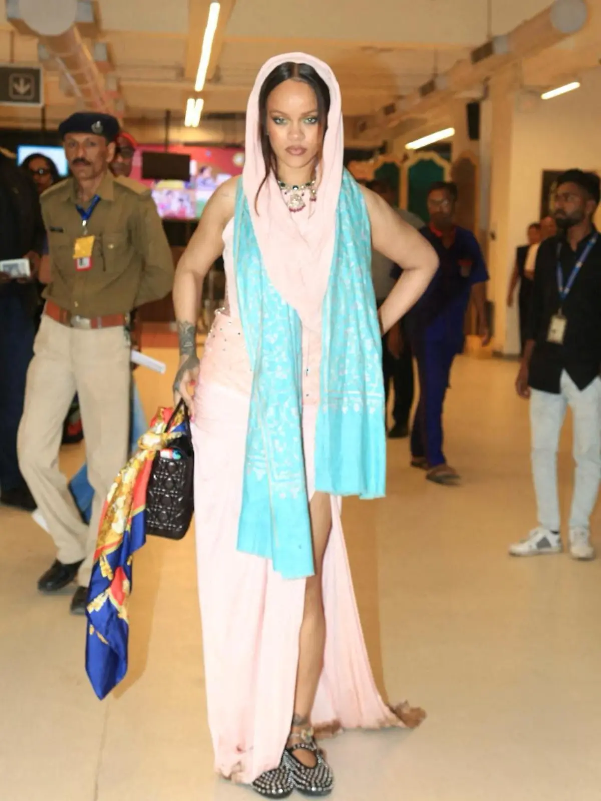 Rihanna poses for a picture before she leaves after performing at the pre-wedding celebrations of Anant Ambani, son of Mukesh Ambani, the Chairman of Reliance Industries, and Radhika Merchant, daughter of industrialist Viren Merchant, at the airport in Jamnagar, Gujarat, India, March 2, 2024. Reliance Industries/Handout via REUTERS THIS IMAGE HAS BEEN SUPPLIED BY A THIRD PARTY. NO RESALES. NO ARCHIVES.