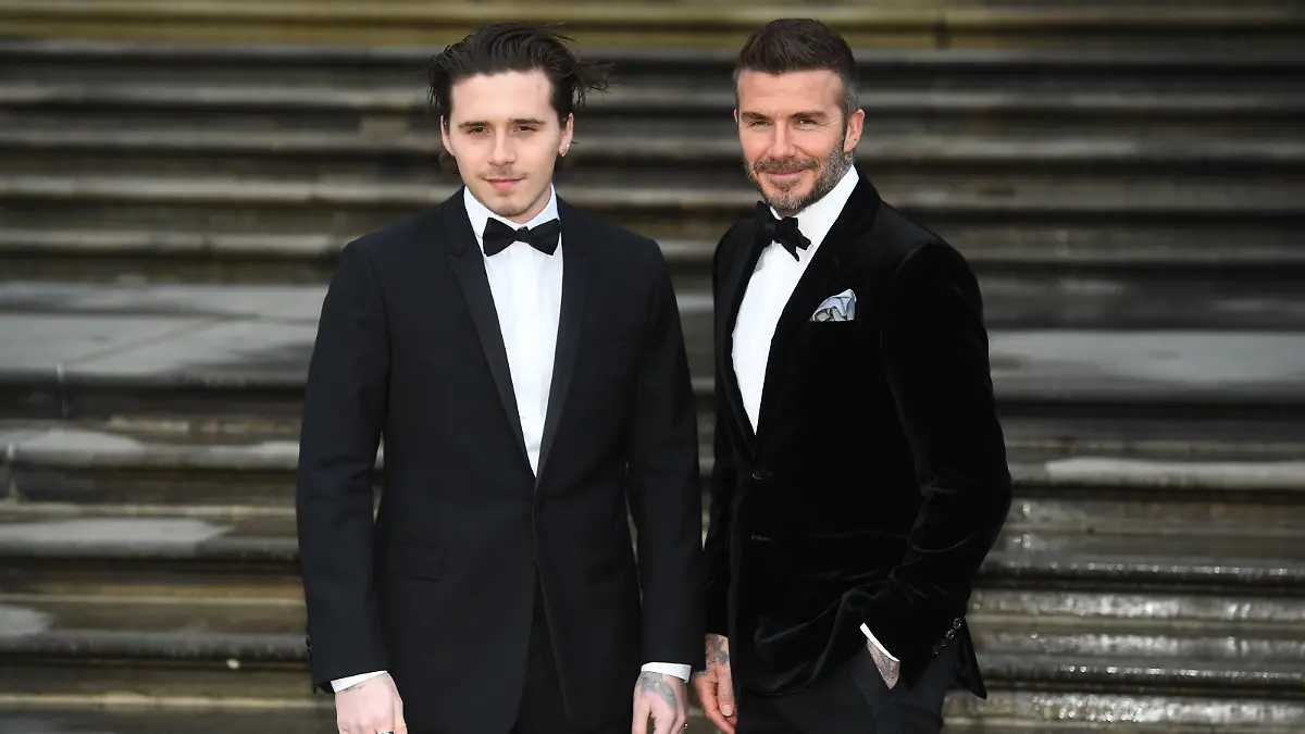 Brooklyn Beckham turns 21. File photo dated 04/04/19 of David Beckham (right) and his son Brooklyn attending the global premiere of Netflix's 'Our Planet' at the Natural History Museum in Kensington, London. Brooklyn, the eldest son of David and Victoria, is celebrating his 21st birthday. Issue date: Wednesday March 4, 2020. He has spent his entire life in the spotlight, from entering the world on March 4 1999, through his childhood and his teens, to now. See PA story SHOWBIZ Beckham Pictures. Photo credit should read: Kirsty O'Connor/PA Wire URN:51126510
