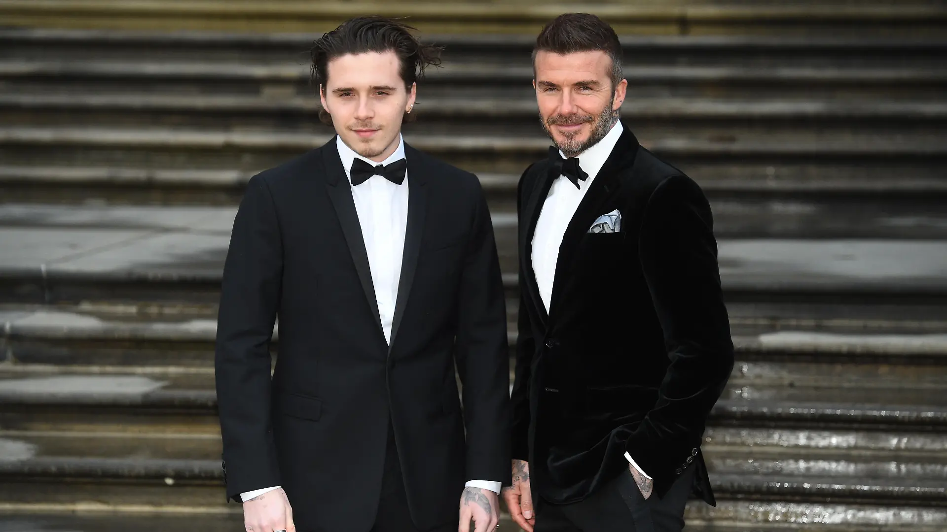 Brooklyn Beckham turns 21. File photo dated 04/04/19 of David Beckham (right) and his son Brooklyn attending the global premiere of Netflix's 'Our Planet' at the Natural History Museum in Kensington, London. Brooklyn, the eldest son of David and Victoria, is celebrating his 21st birthday. Issue date: Wednesday March 4, 2020. He has spent his entire life in the spotlight, from entering the world on March 4 1999, through his childhood and his teens, to now. See PA story SHOWBIZ Beckham Pictures. Photo credit should read: Kirsty O'Connor/PA Wire URN:51126510