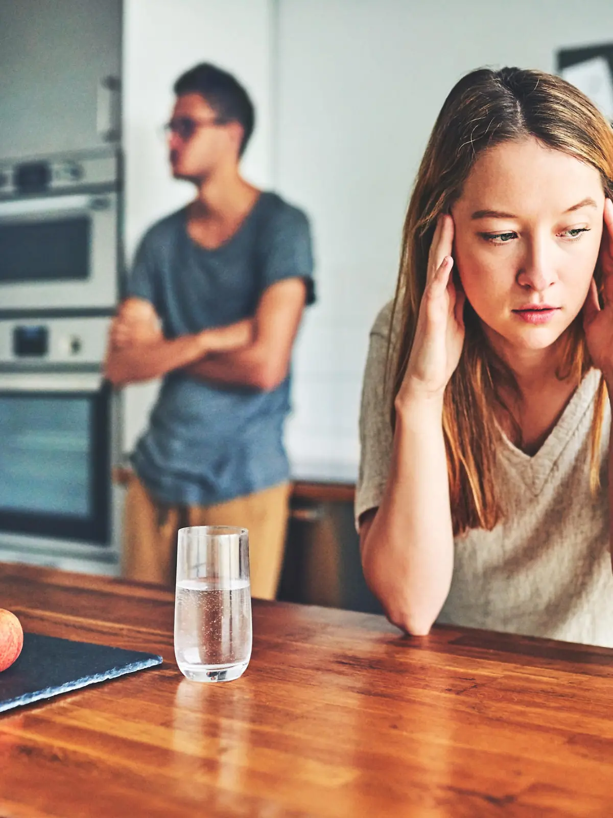 Shot of a couple having a disagreement at home