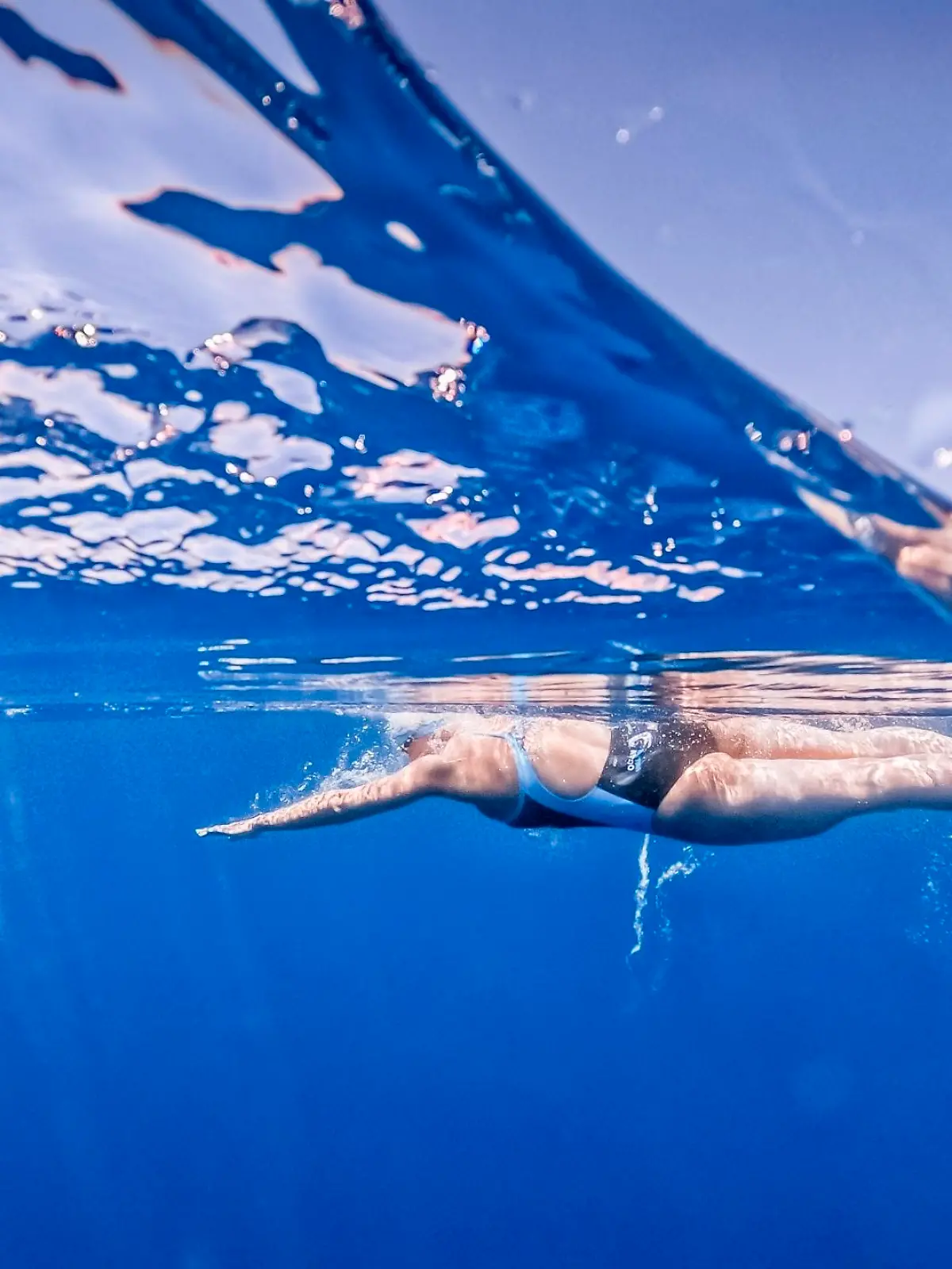 In this image released on Thursday, June 10th 2021, Nathalie Pohl swims the Menorca Channel. Pohl's time of 9h50s was an hour faster than the previous record holder and only 26 minutes slower than the fastest man. HANDOUT IMAGE - please refer to special instructions. (Marc Le Cornu/NP-Invest GmbH/news aktuell via AP Images)