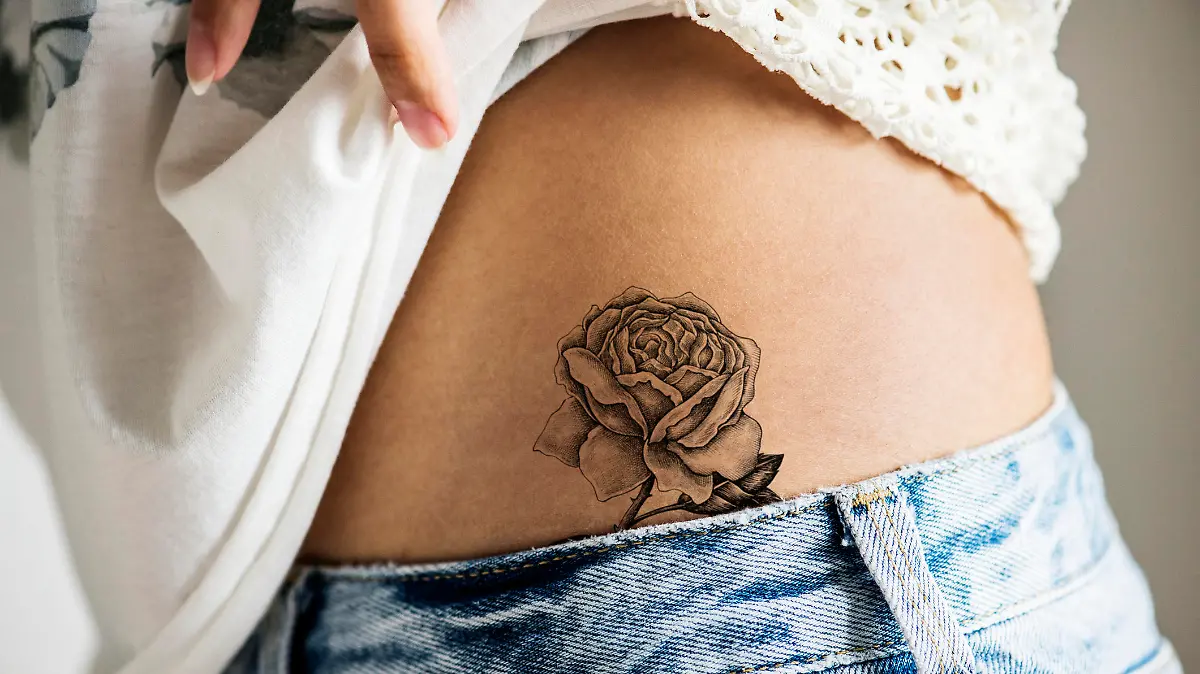 Closeup of lower hip tattoo of a woman
***This tattoo is derived from our own 3D generic designs. They do not infringe on any copyright design.