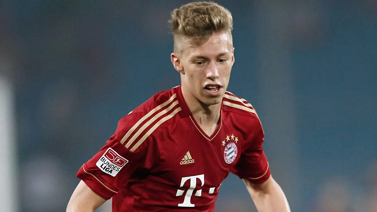 BEIJING, CHINA - JULY 24:  Mitchell Weiser of FC Bayern Muenchen controls the ball during the pre-season friendly match between Beijing Guo'an and Bayern Muenchen at Beijing Workers Stadium on July 24, 2012 in Beijing, China.(Photo by Lintao Zhang/Getty Images)