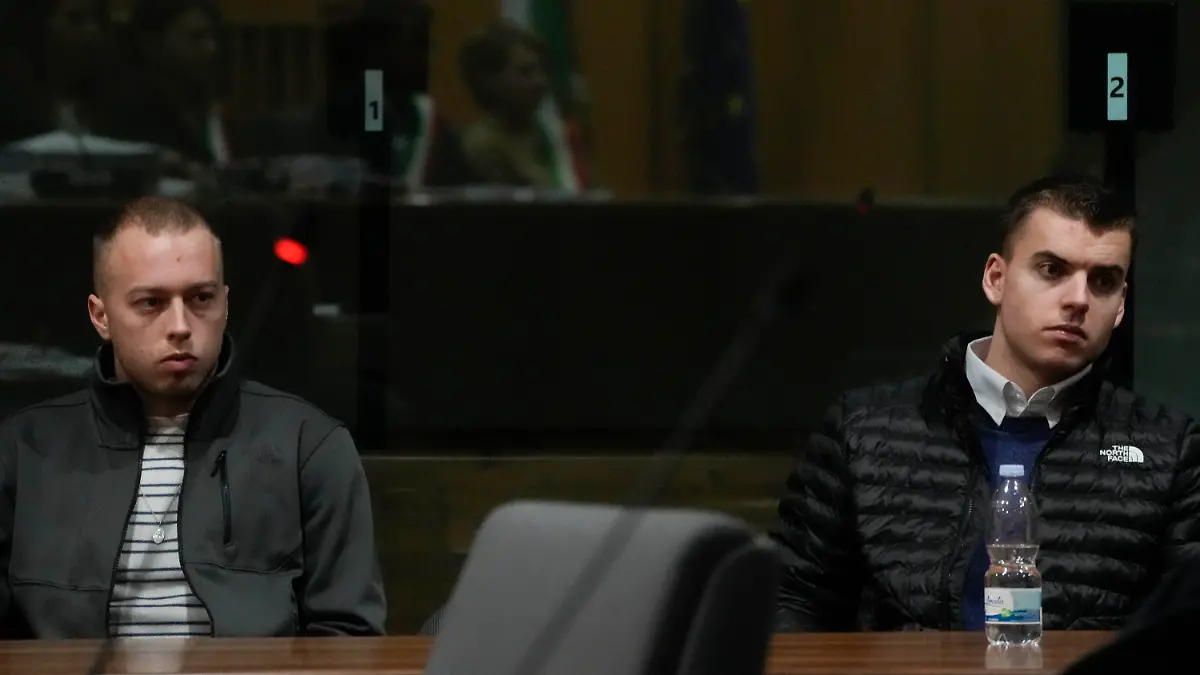 Gabriel Natale-Hjorth, right, and Finnegan Lee Elder, attend the appeal trial for the killing of Italian policeman Mario Cerciello Rega, in Rome, Friday, March. 8, 2024. The two American men face a new trial in the slaying of an Italian plainclothes police officer during a botched sting operation after Italy's highest court threw out their convictions. (AP Photo/Gregorio Borgia)