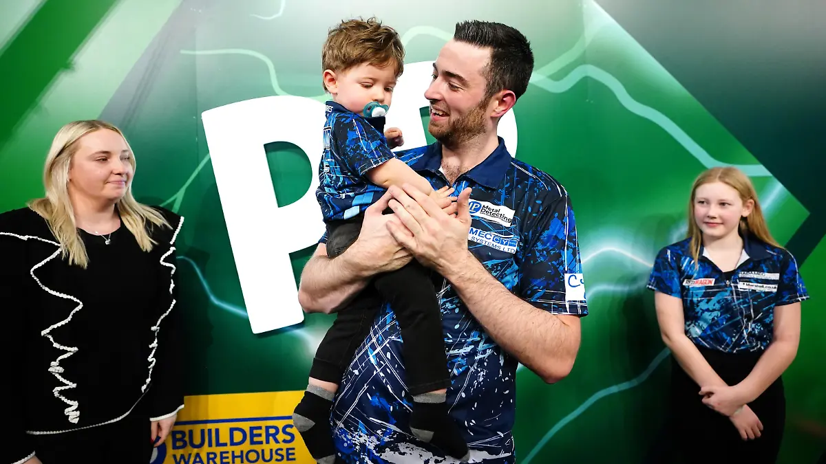 Paddy Power World Darts Championship 2023/24 - Final - Alexandra Palace. Luke Humphries celebrates with his family after winning the final of the Paddy Power World Darts Championship against Luke Littler at Alexandra Palace, London. Picture date: Wednesday January 3, 2024. See PA story DARTS World. Photo credit should read: Zac Goodwin/PA Wire. RESTRICTIONS: Use subject to restrictions. Editorial use only, no commercial use without prior consent from rights holder. URN:74988717