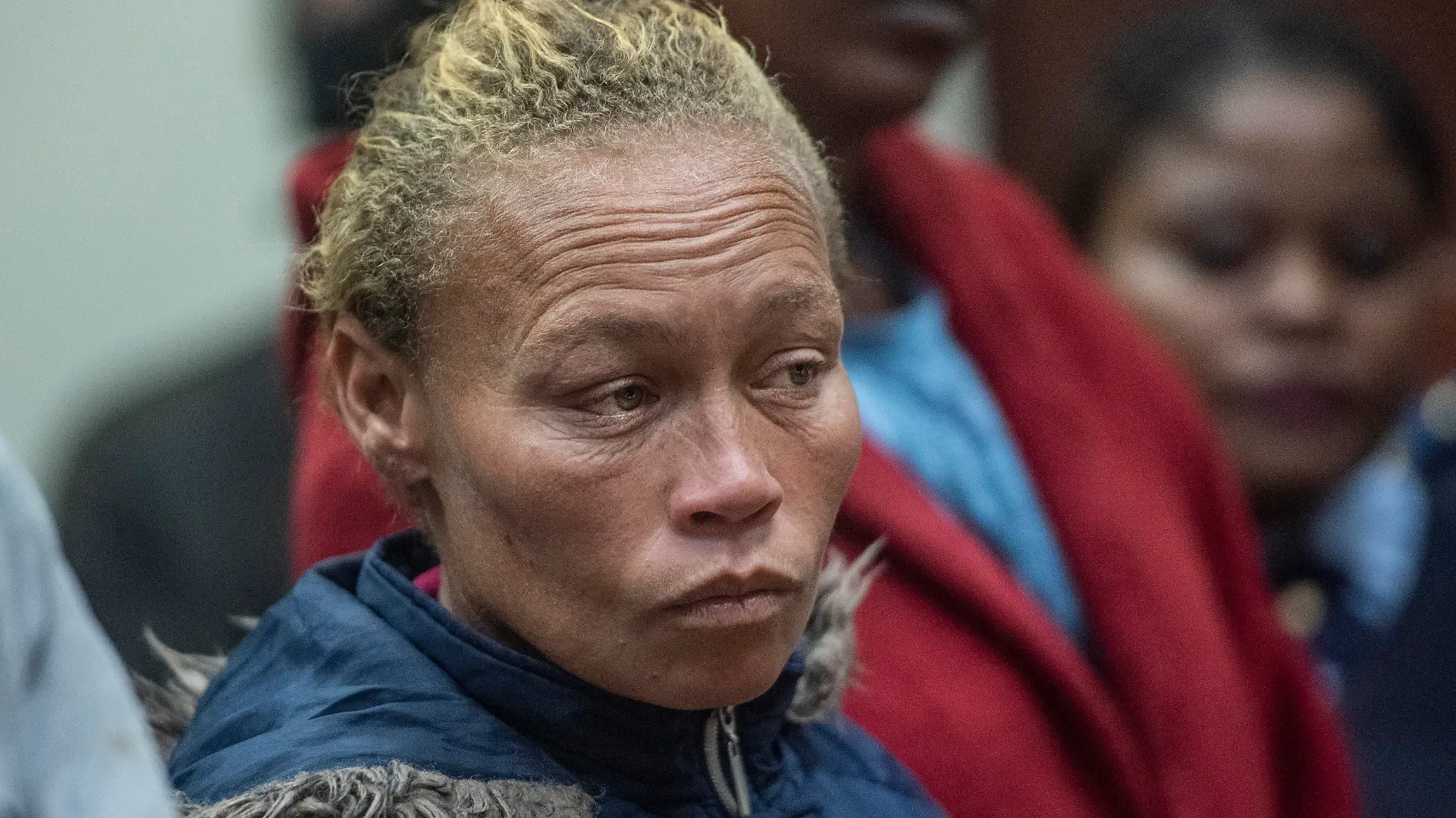CAPTION CORRECTS DATE The mother of missing 6-year-old Joslin Smith, Kelly Smith, appears in court in Vredenburg, South Africa, Thursday, March 7, 2024. Smith has been charged with kidnapping and selling or trafficking her daughter in a shocking twist in a case that has enraptured the country and sparked deep anger in the small, poor coastal community where the family lives. (AP Photo)