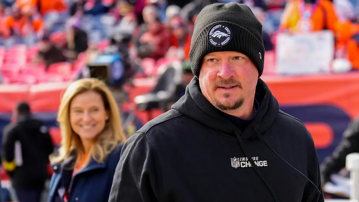 FILE - Denver Broncos head coach Nathaniel Hackett looks on before an NFL football game against the Arizona Cardinals on Sunday, Dec. 18, 2022, in Denver. The New York Jets have hired former Denver Broncos coach Nathaniel Hackett as their offensive coordinator. The team announced the hiring Thursday, Jan. 26, 2023, of the 43-year-old Hackett, who replaces Mike LaFleur after coach Robert Saleh and the Jets interviewed at least 15 candidates for the vacancy. (AP Photo/Jack Dempsey, File)