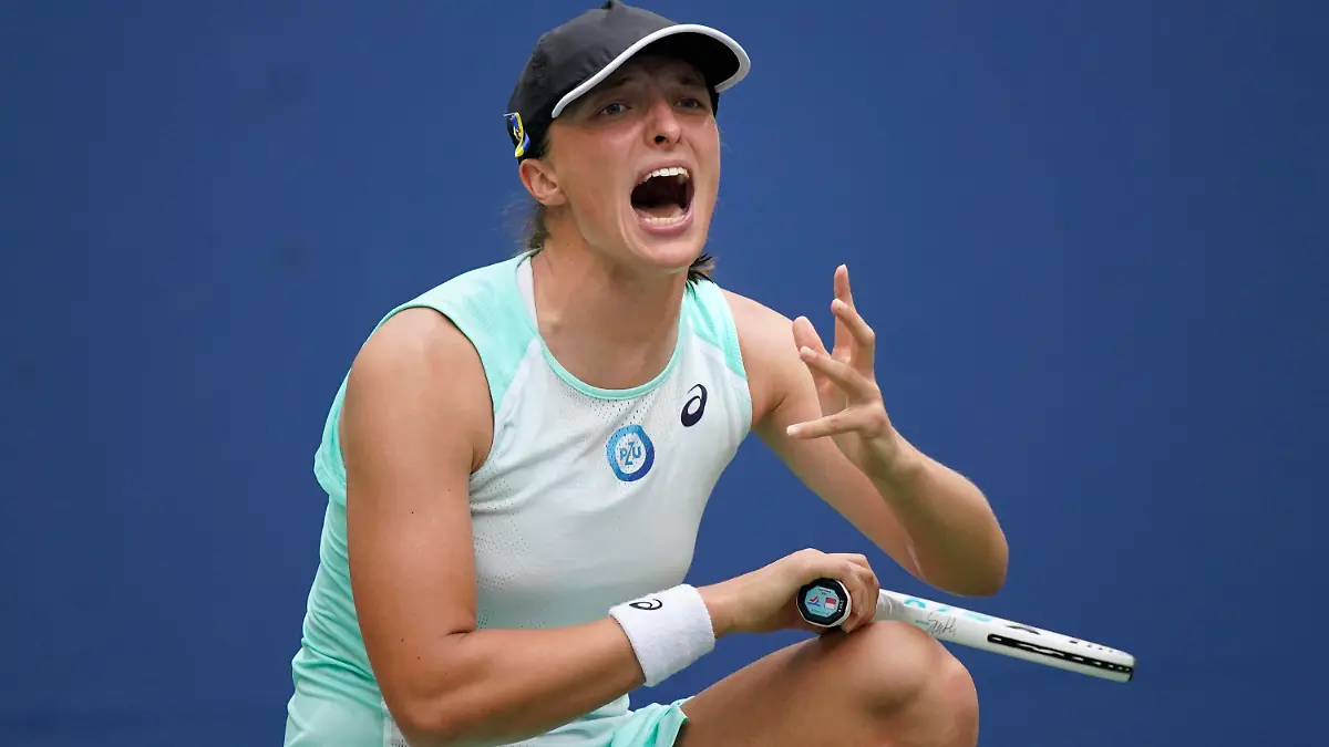 Iga Swiatek, of Poland, reacts during her match against Jule Niemeier, of Germany, during the fourth round of the U.S. Open tennis championships, Monday, Sept. 5, 2022, in New York. (AP Photo/Eduardo Munoz Alvarez)