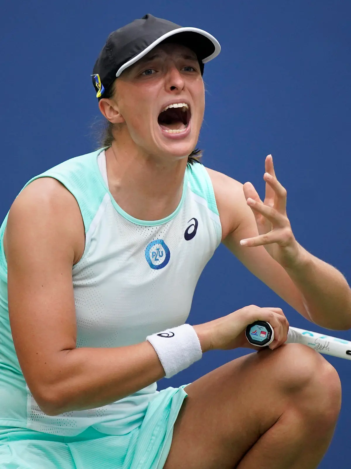 Iga Swiatek, of Poland, reacts during her match against Jule Niemeier, of Germany, during the fourth round of the U.S. Open tennis championships, Monday, Sept. 5, 2022, in New York. (AP Photo/Eduardo Munoz Alvarez)