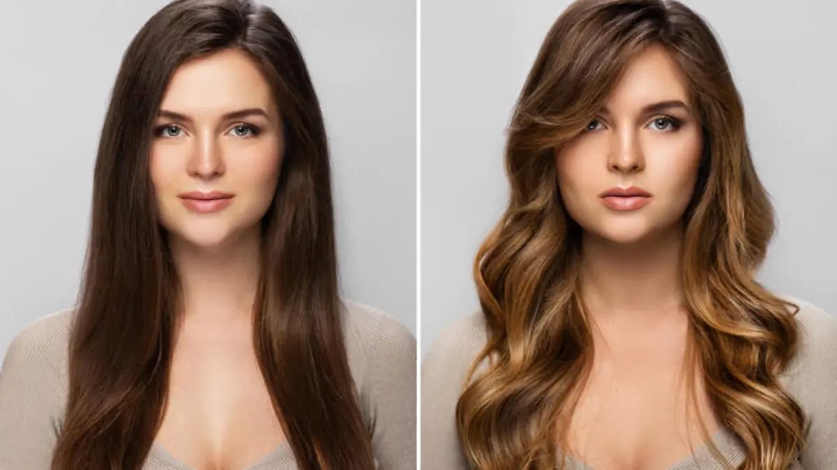 Result of makeover. Young woman happy with her beautiful hair after dyeing and styling in a professional salon.