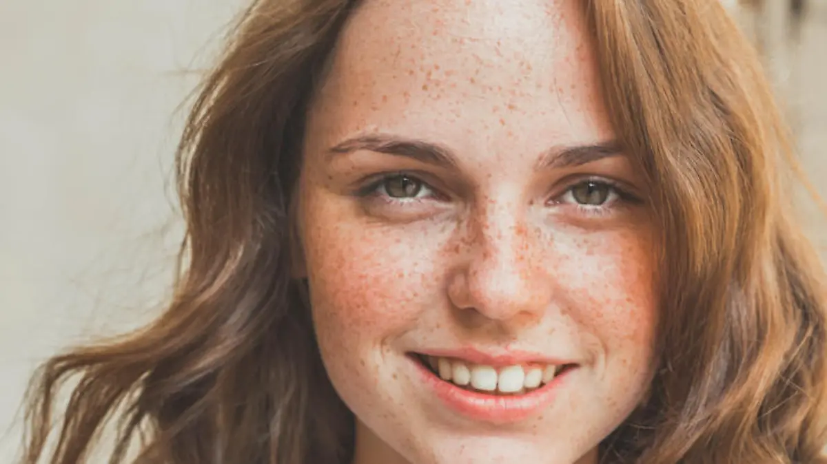 beautiful  happy young woman  hipster portrait face  with freckles and smile