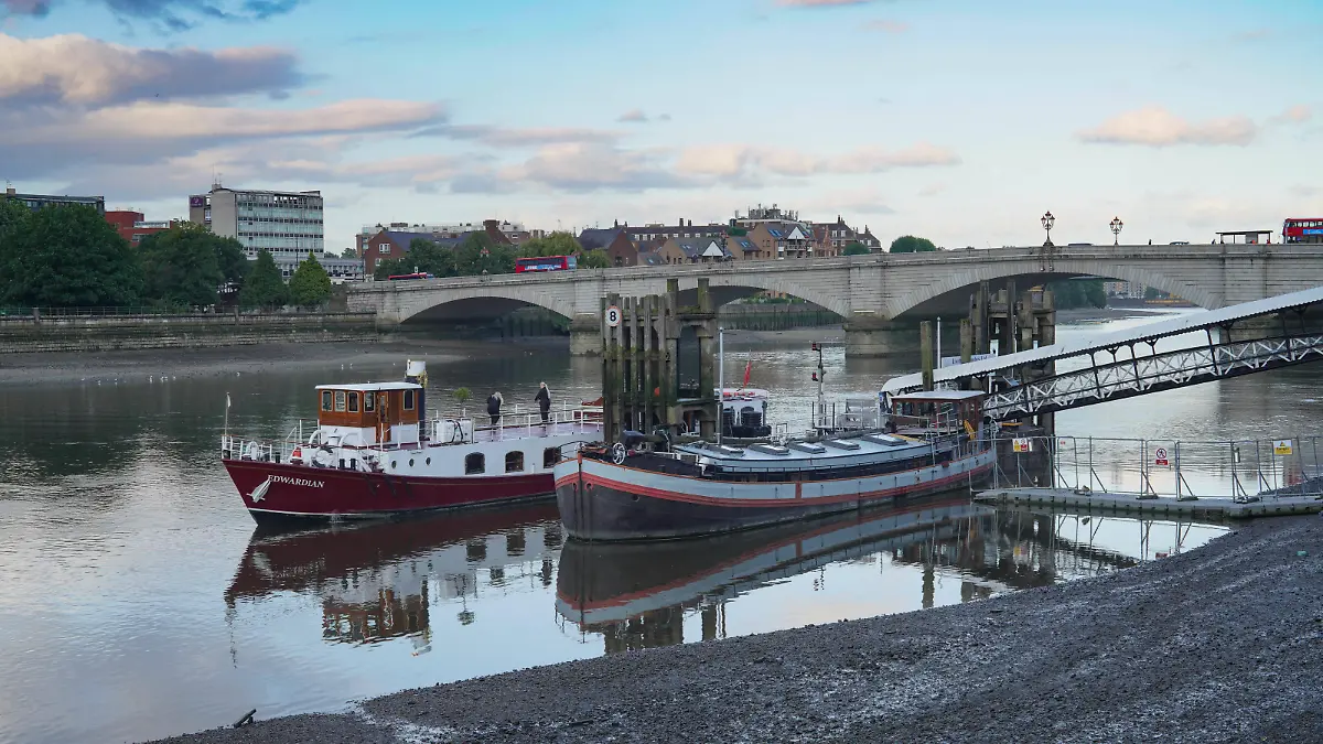 Views of Putney Pier and Putney Bridge in the background, with the MV Edwardian boat waiting to board for a river cruise. Photo date: Friday, August 6, 2021. Photo credit should read: Richard Gray/EMPICS