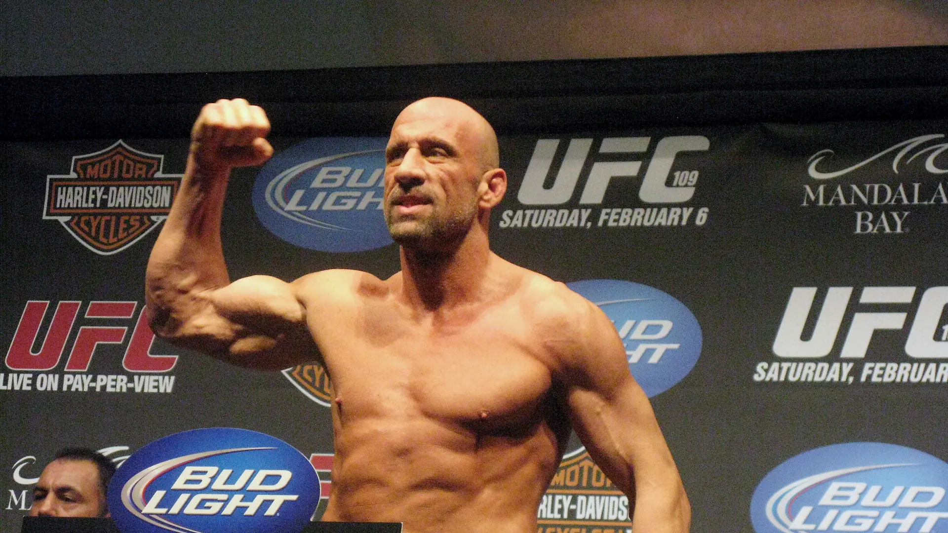 FILE - UFC Hall of Famer Mark Coleman gestures during the weigh-in ahead of his UFC 109 fight against Randy Couture Friday, Feb. 5, 2010, in Las Vegas. Former UFC champion Mark Coleman was airlifted to a hospital and was “battling for his life” after saving his parents from a house fire in Ohio this week, his daughter said on Instagram. Morgan Coleman posted Tuesday night, March 12, 2024, that her father went into the burning house several times and was able to bring out his mother and father. (Neil Davidson/The Canadian Press via AP, File)
