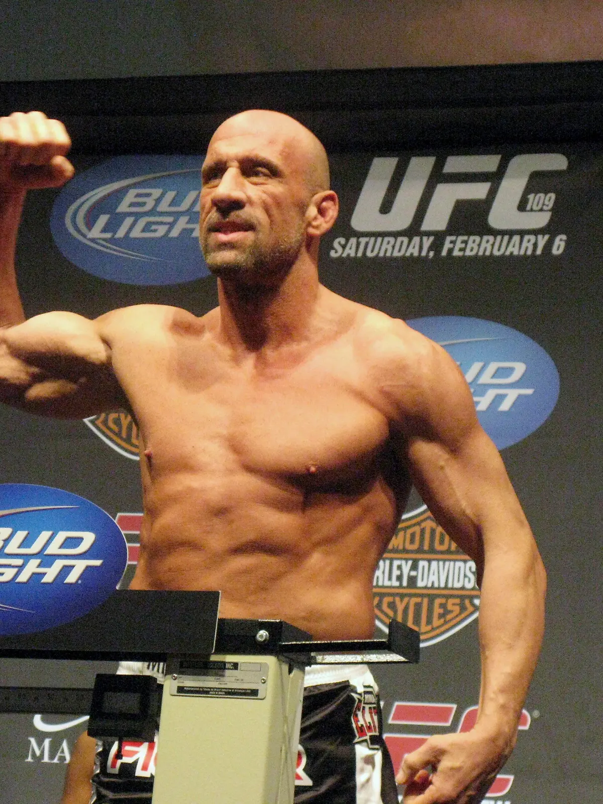 FILE - UFC Hall of Famer Mark Coleman gestures during the weigh-in ahead of his UFC 109 fight against Randy Couture Friday, Feb. 5, 2010, in Las Vegas. Former UFC champion Mark Coleman was airlifted to a hospital and was “battling for his life” after saving his parents from a house fire in Ohio this week, his daughter said on Instagram. Morgan Coleman posted Tuesday night, March 12, 2024, that her father went into the burning house several times and was able to bring out his mother and father. (Neil Davidson/The Canadian Press via AP, File)
