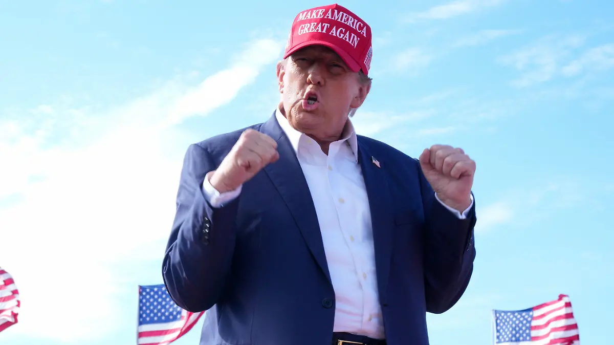 Republican presidential candidate former President Donald Trump gestures to the crowd at a campaign rally Saturday, March 16, 2024, in Vandalia, Ohio. (AP Photo/Jeff Dean)